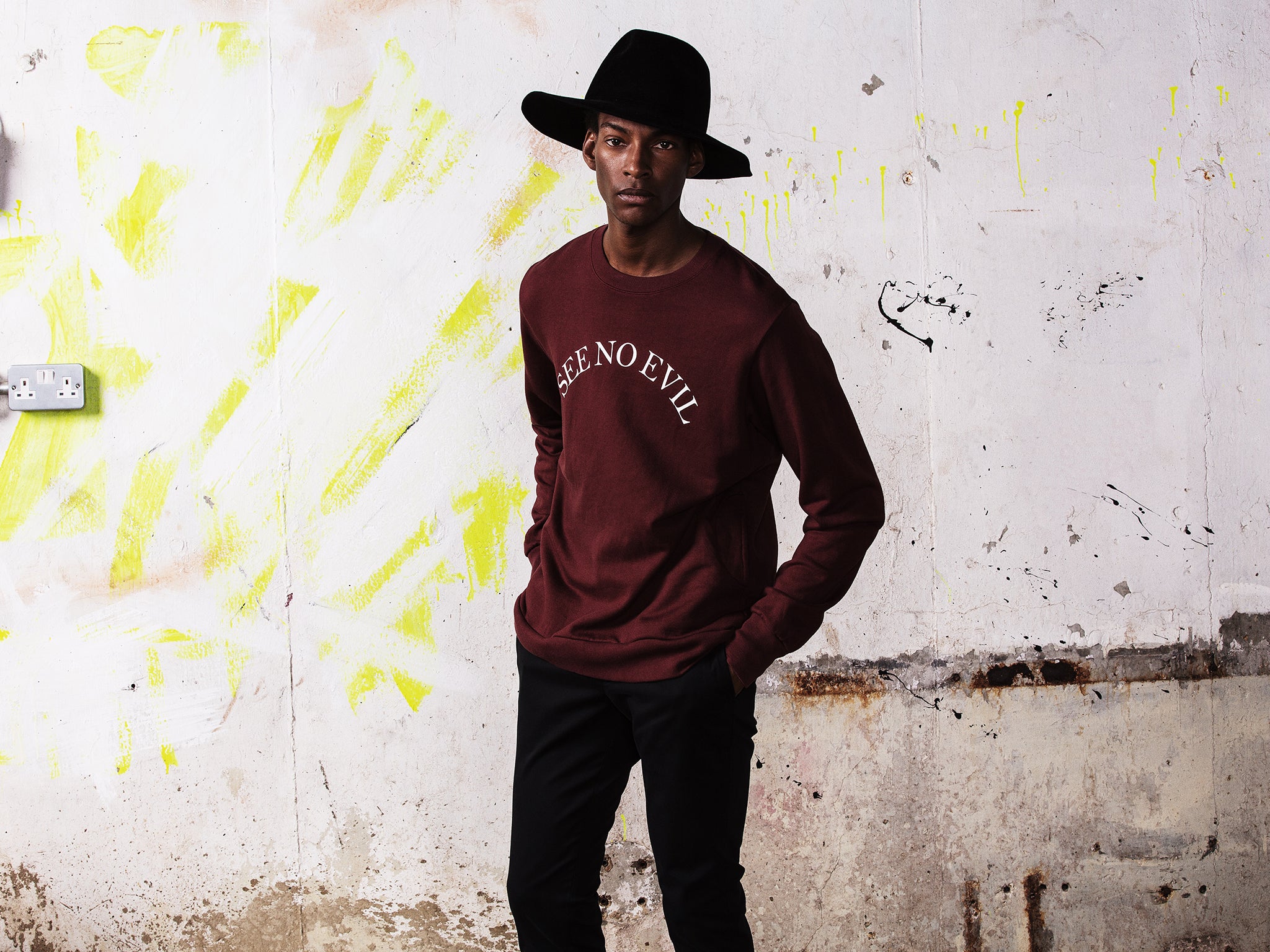 A signature Undercover slogan sweatshirt, £248, Matches Fashion.com