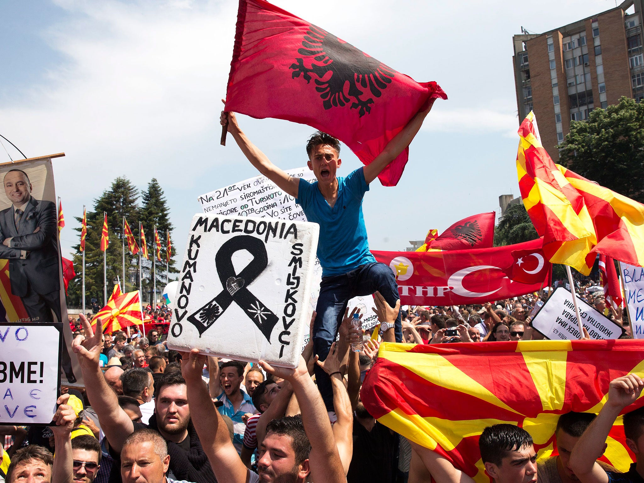 Protesters in Skopje wave Albanian and Macedonian flags