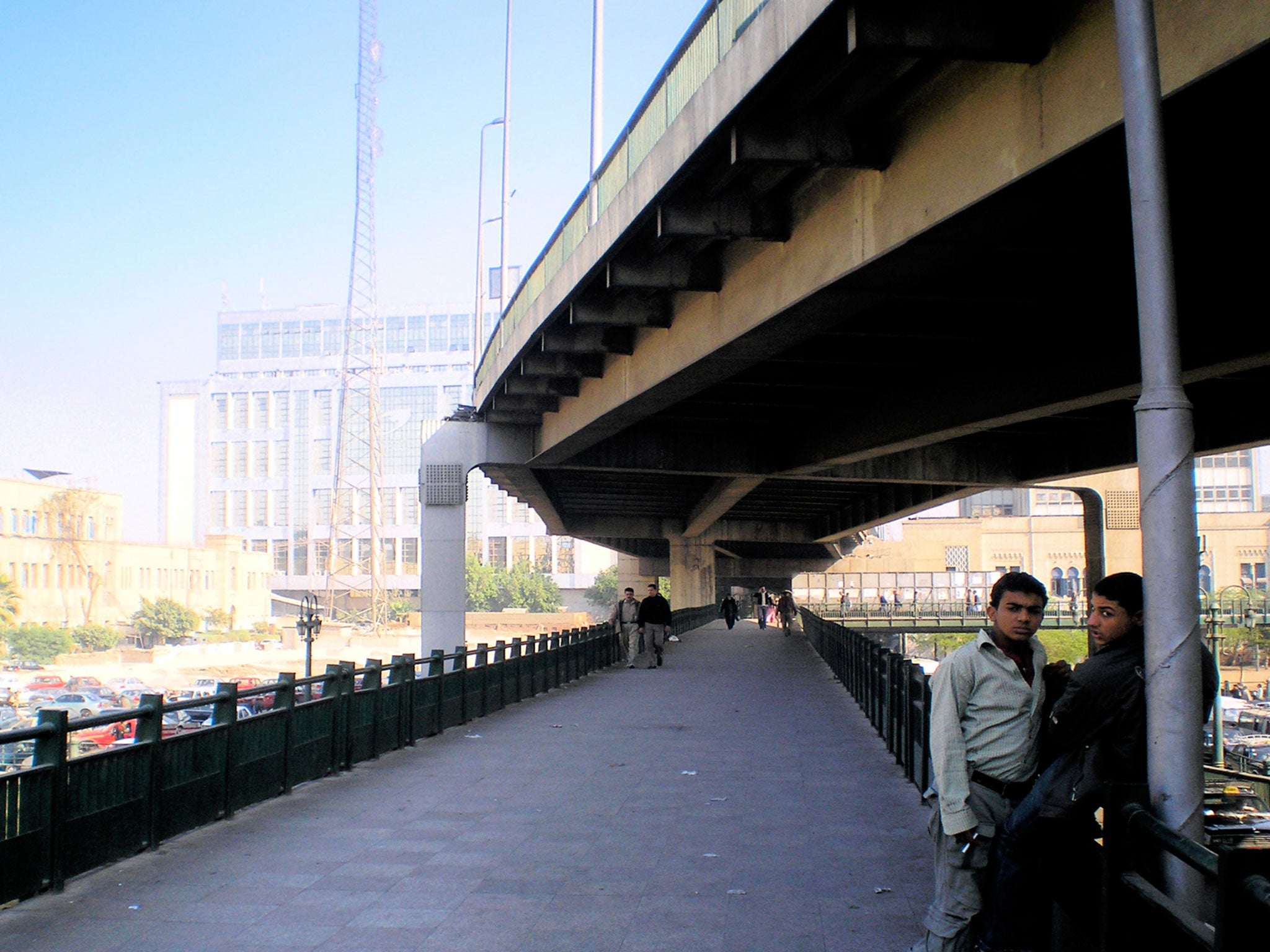 Going underground: two men pictured as part of an art project that explores people and public space in Cairo