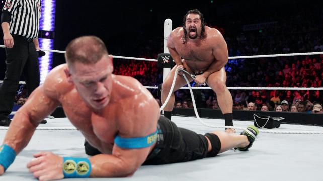 Rusev waits to attack Cena with the turnbuckle