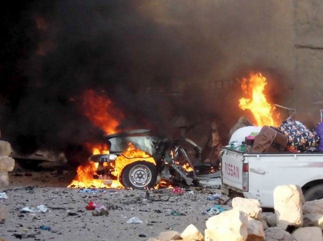 Civilian belongings can be seen in an abandoned truck during fighting in Ramadi