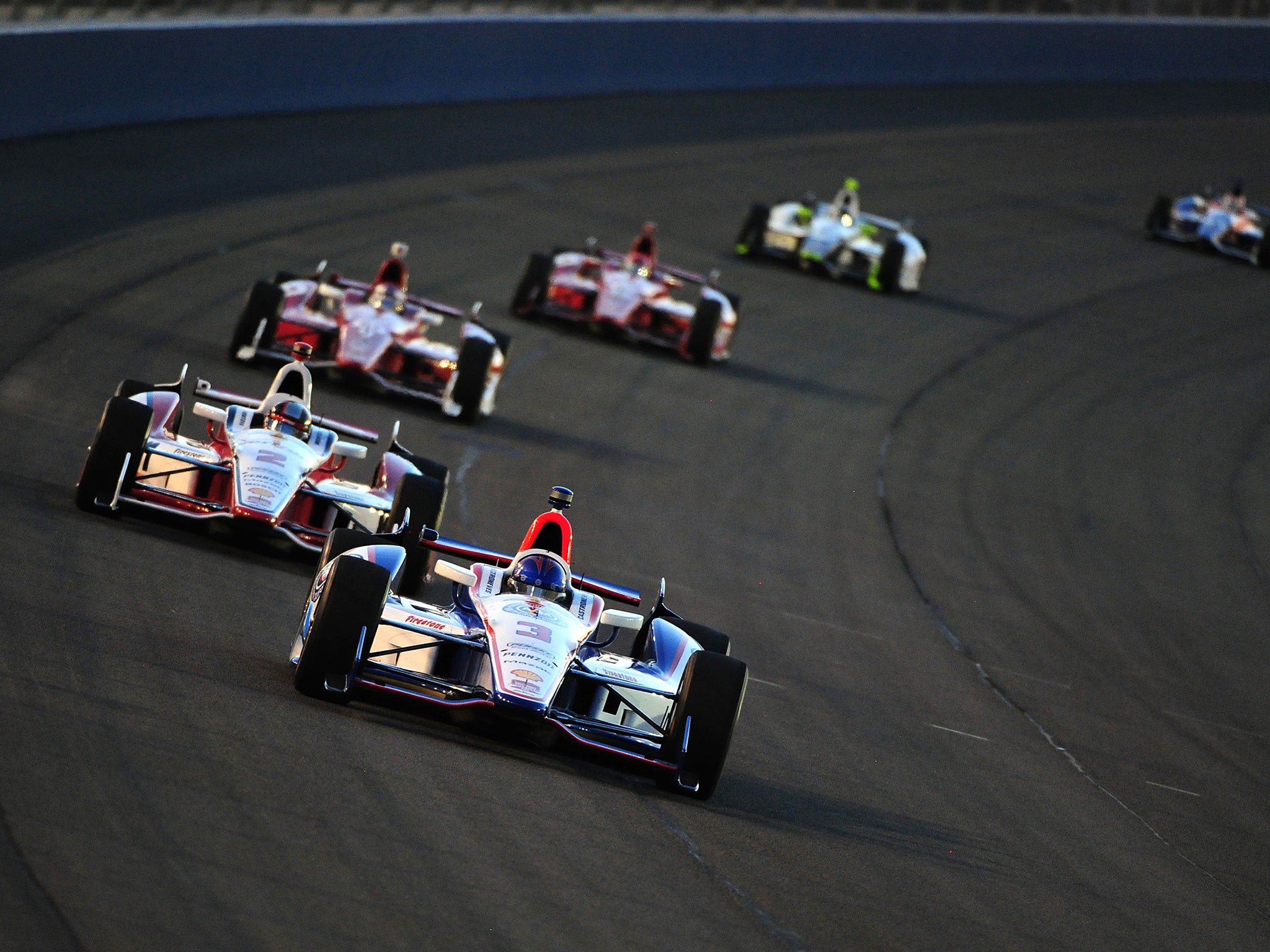 Helio Castroneves (front) suffered a major crash last week