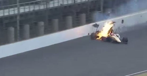 The Honda catches fire after the impact