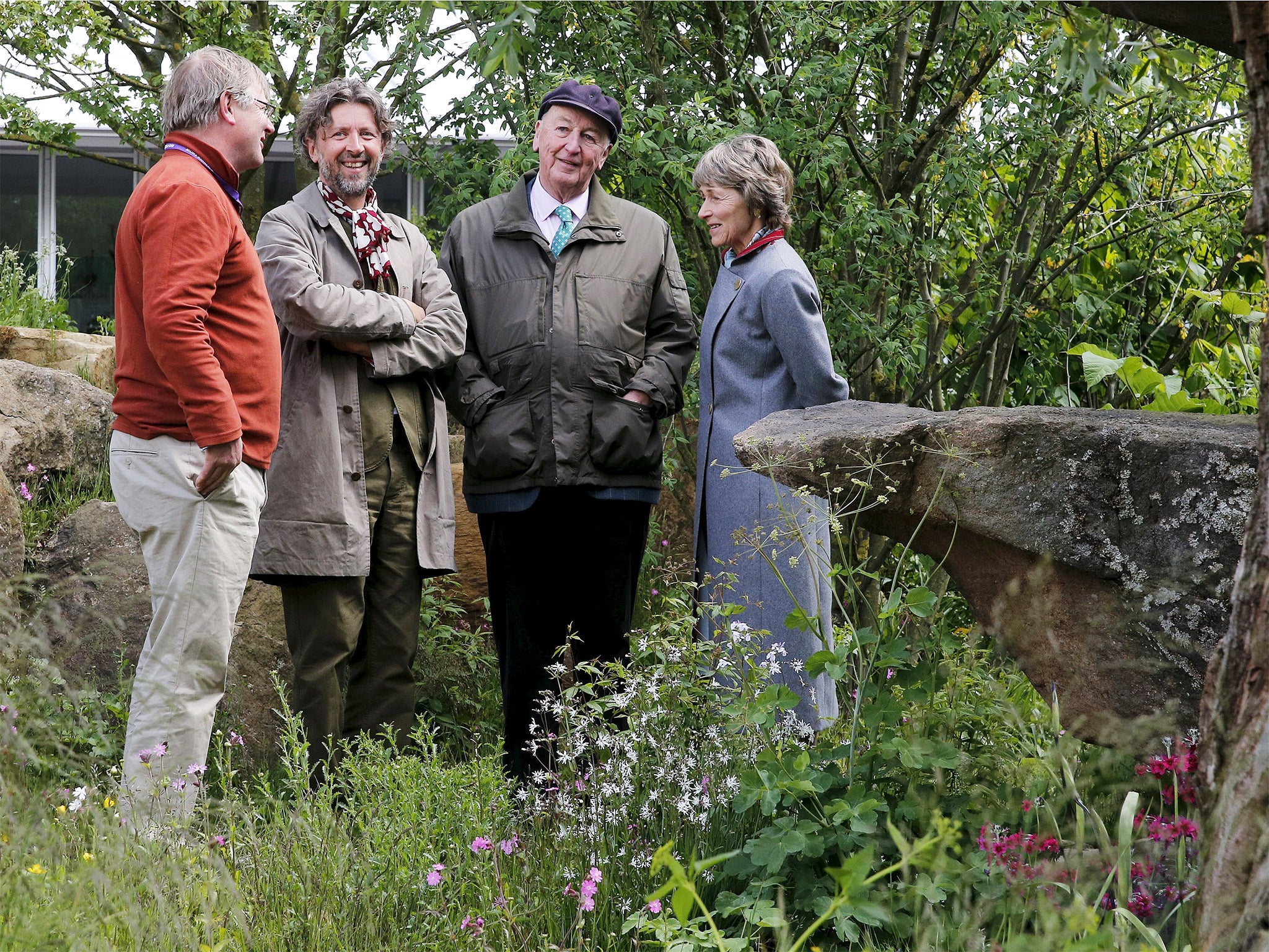 Garden Designer Dan Pearson, second left, talks with the Duke, second right, and Duchess of Devonshire, right, after his garden won the title of Best Show Garden at the Chelsea Flower Show