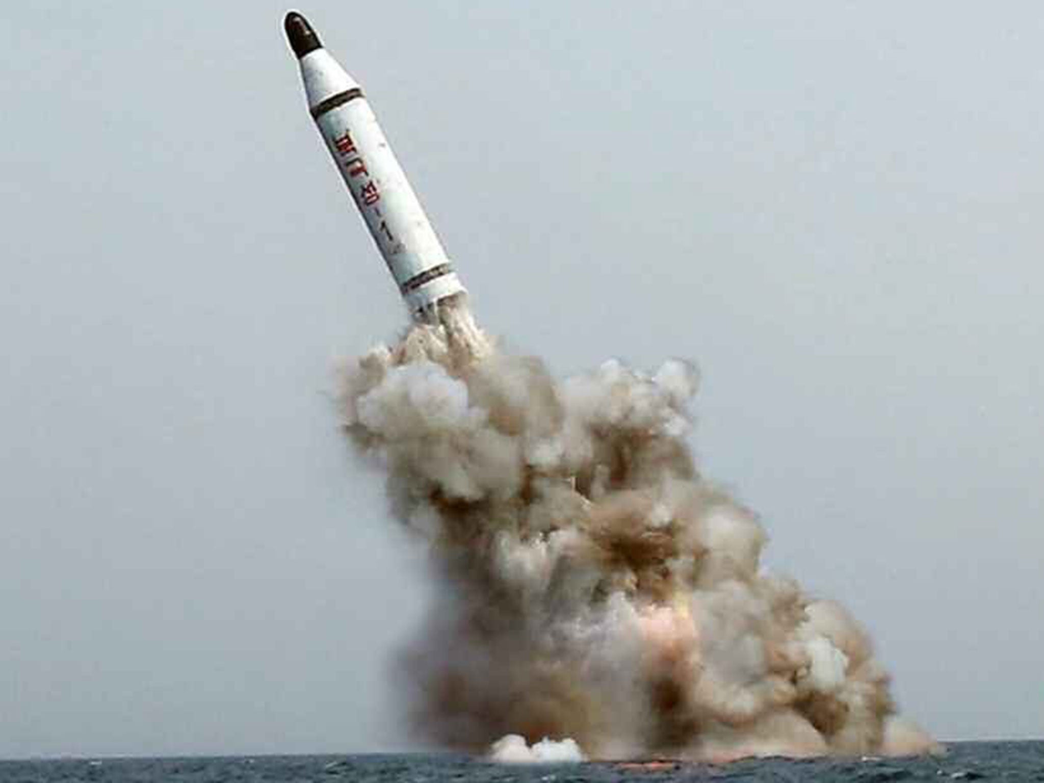 An image released by North Korea's Rodong Shinmun shows what Pyongyang claims to be a ballistic missile launched from a submarine, 9 May 2015