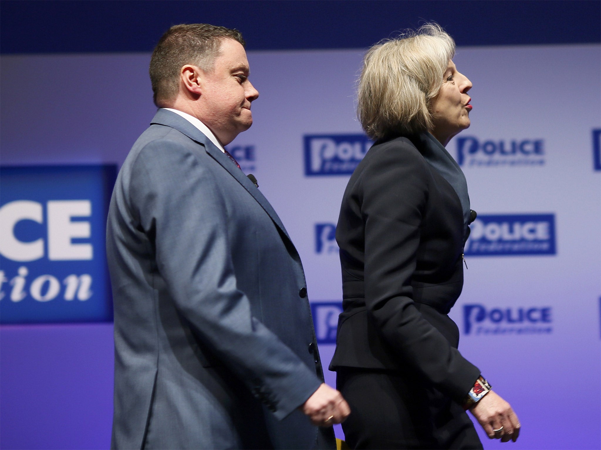 Theresa May and Steve White arrive at the Police Federation’s conference