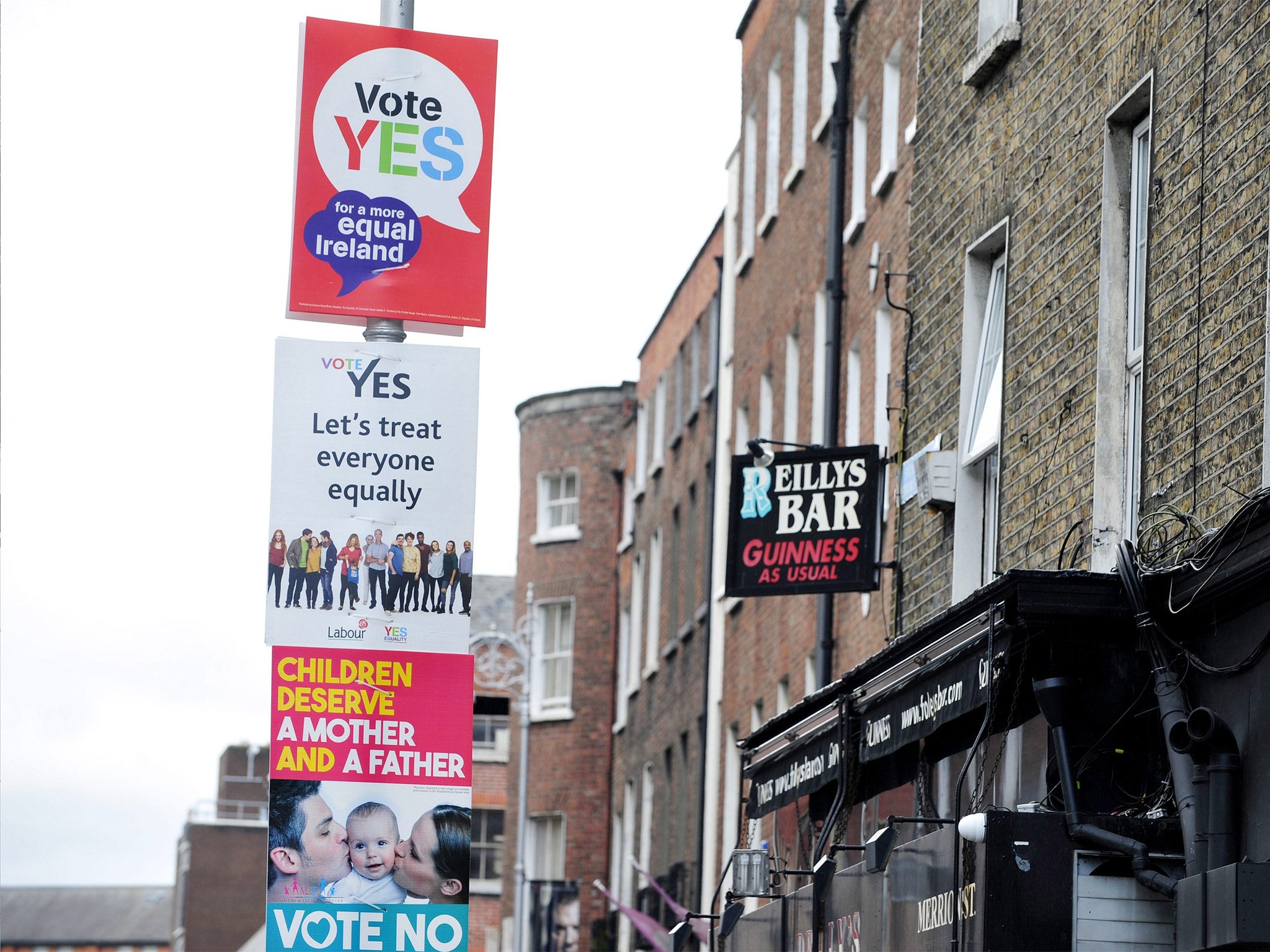 Yes and No campaign posters compete for attention