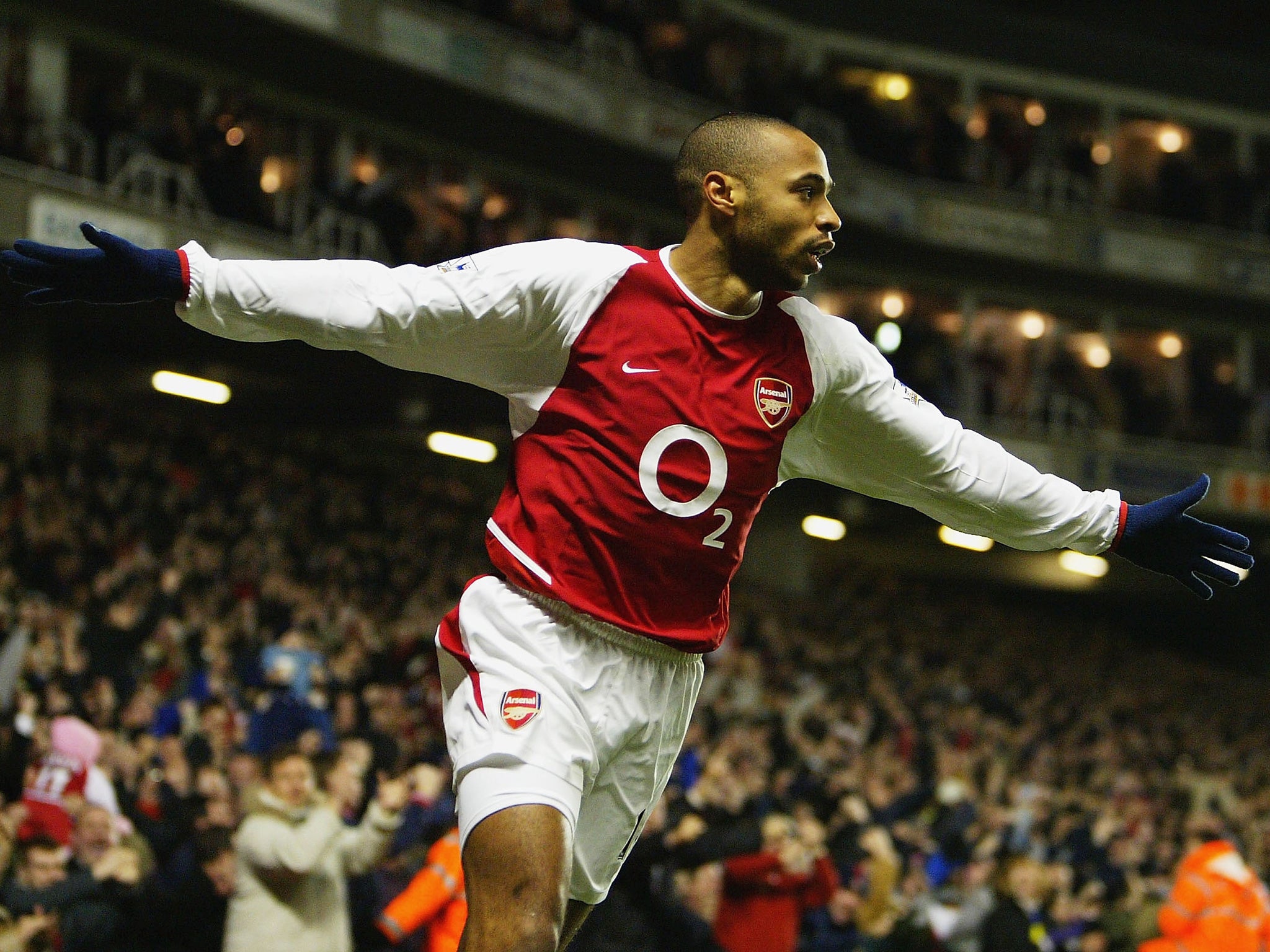 Henry won the Premier League title twice with Arsenal (Getty)