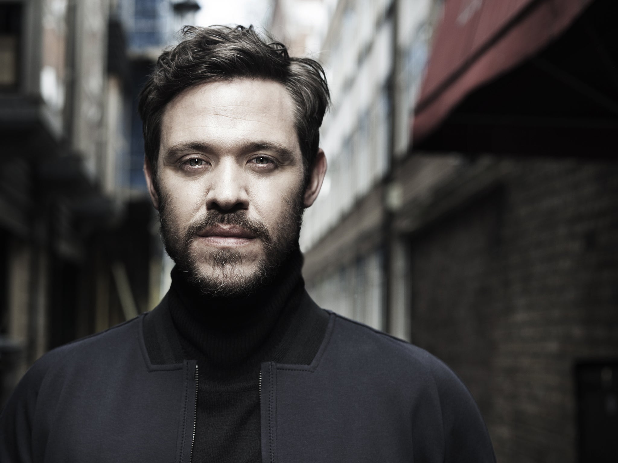 Will Young poses on the streets of Soho to promote his new album 85% Proof