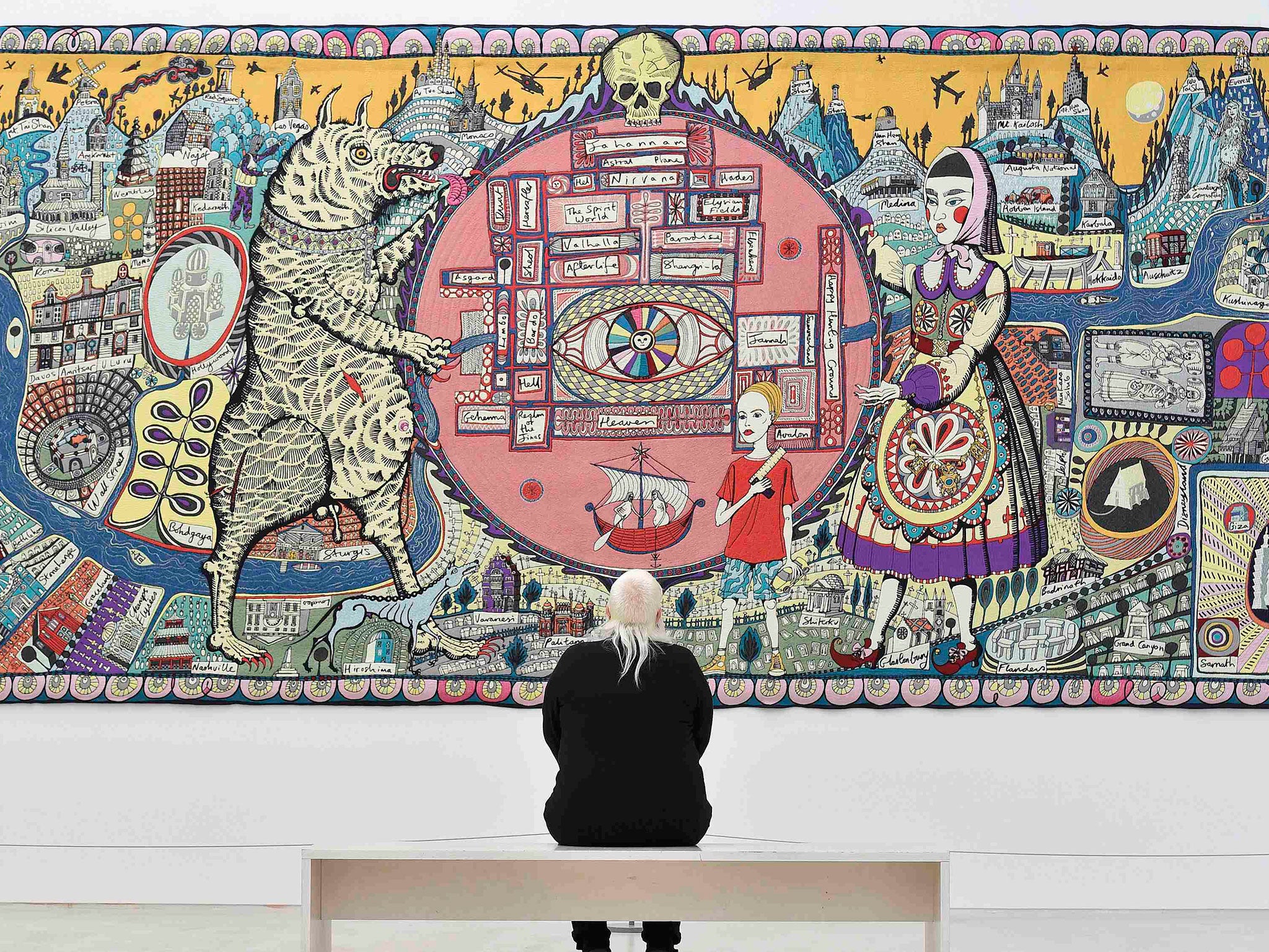 A woman views 'Map of Truths and Beliefs' by British artist Grayson Perry at the launch of his show 'Provincial Punk' at the Turnery Contemporary in Margate