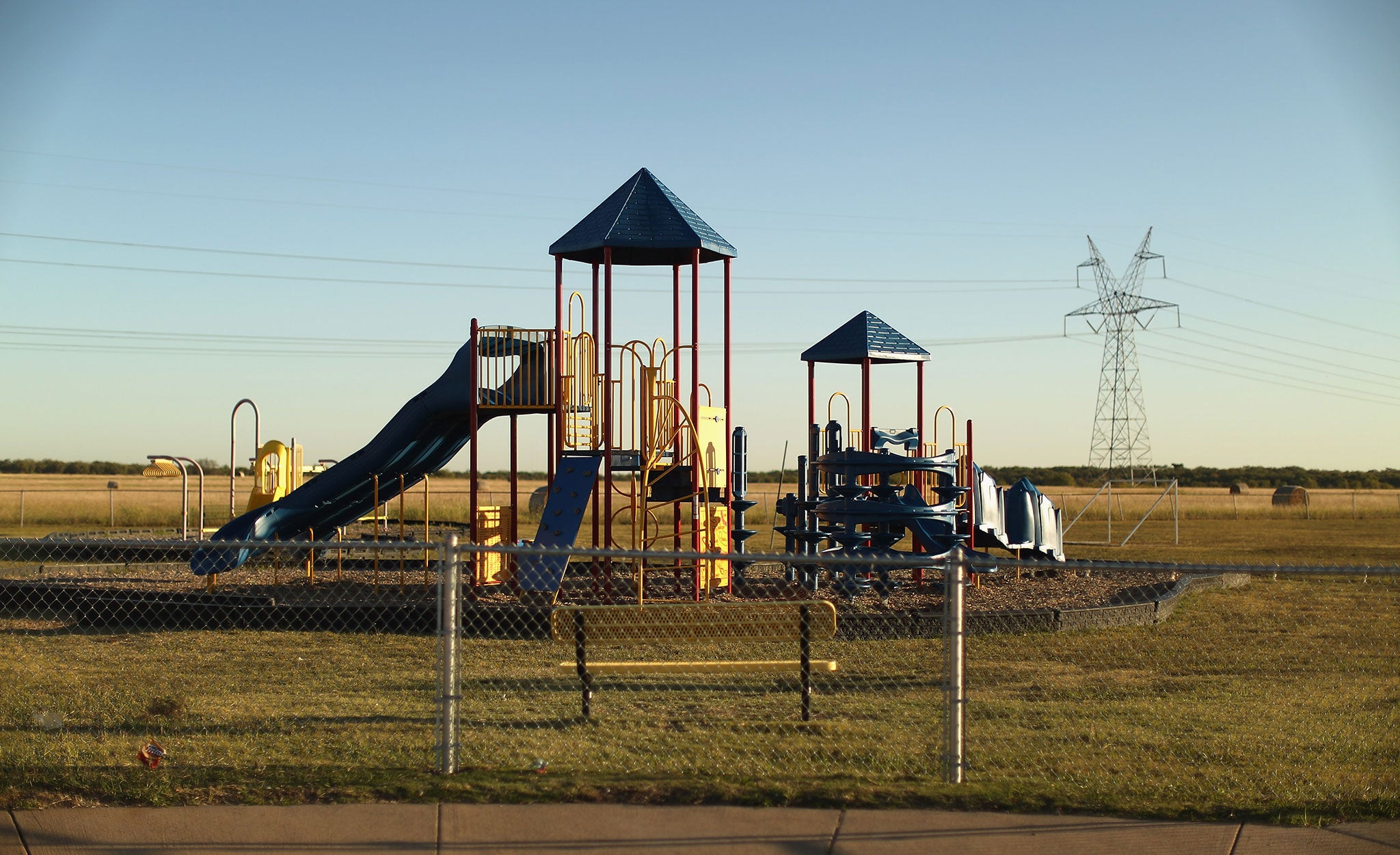 The woman is believed to have been pushing the three-year-old boy back and forth on the swing throughout the night before police intervened