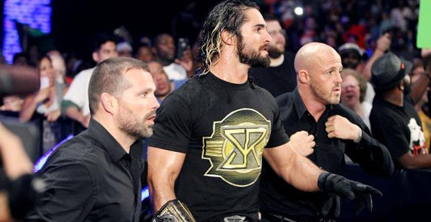 Seth Rollins appears ringside with J&amp;J Security