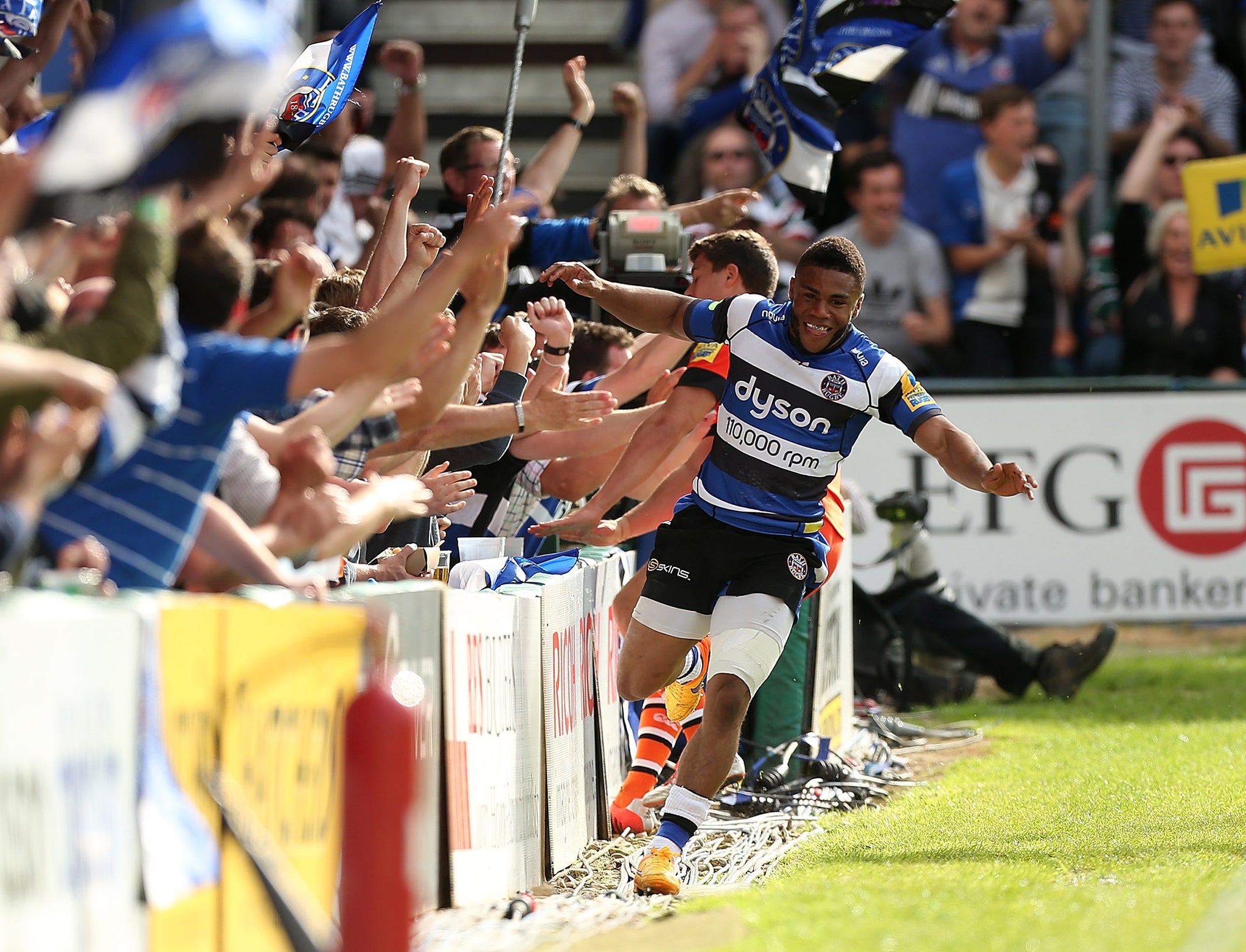 Kyle Eastmond celebrates after scoring a try for Bath