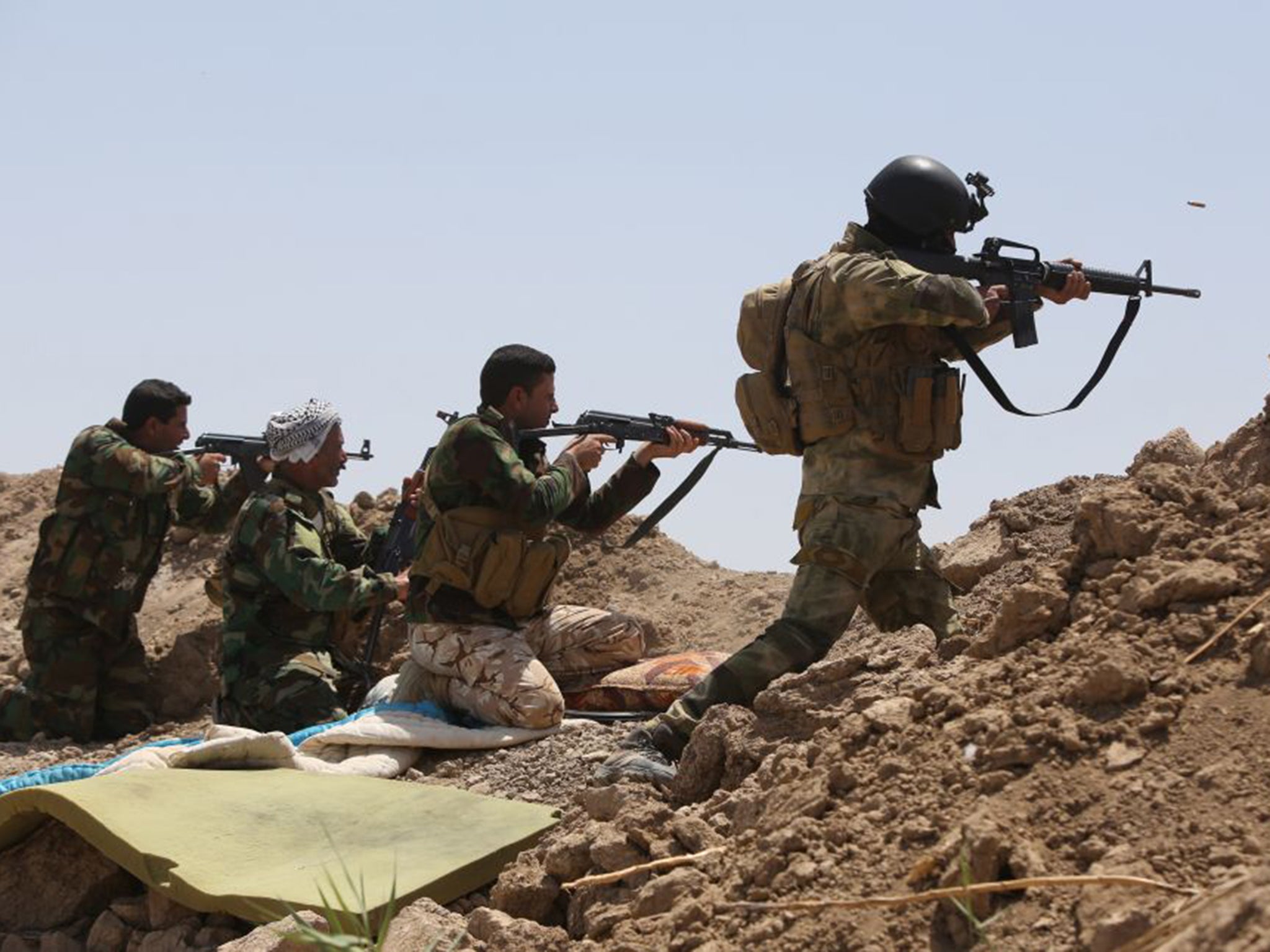 Hundreds of Shia fighters, pictured, moved into Khalidiya on Saturday