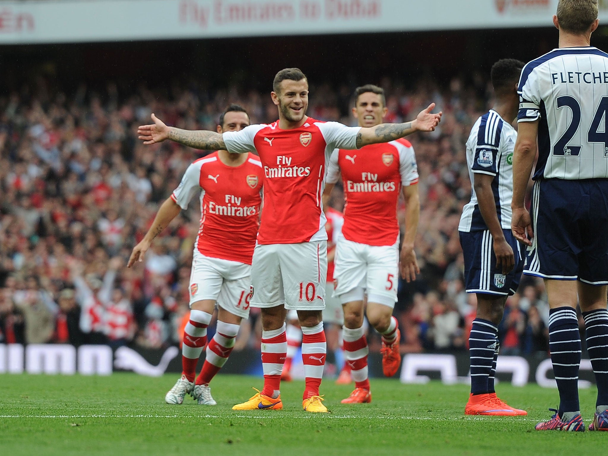 Jack Wilshere celebrates his final-day strike