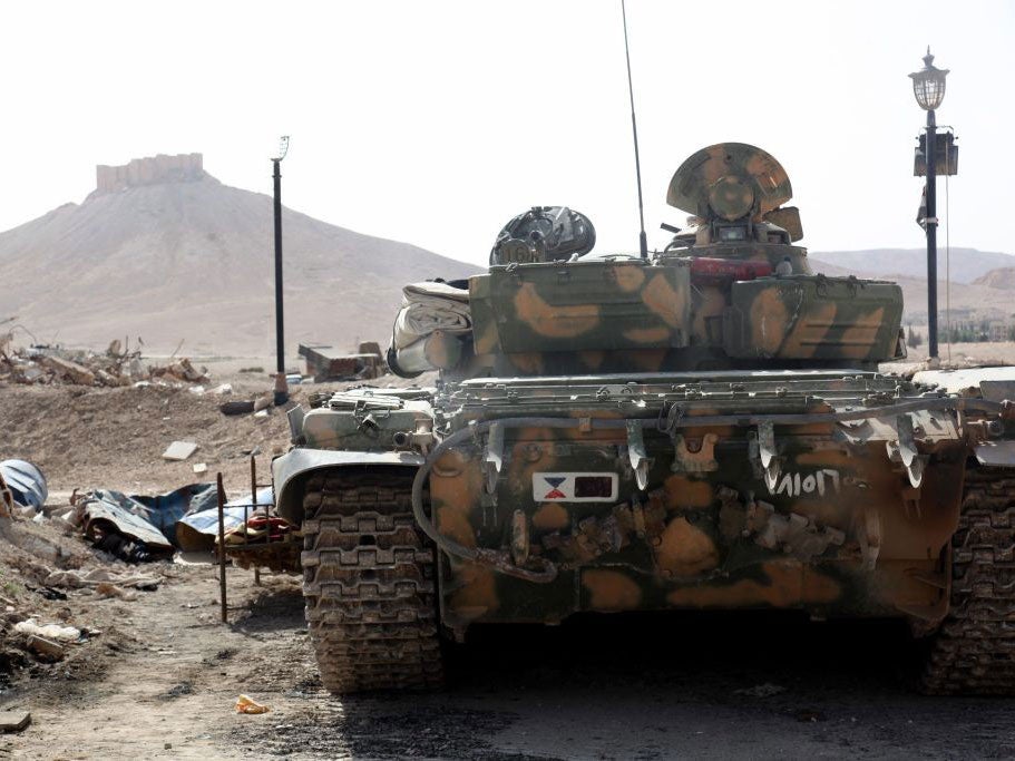 A Syrian army tank during battles with Isis as the group attempted to seize Palmyra on 19 May