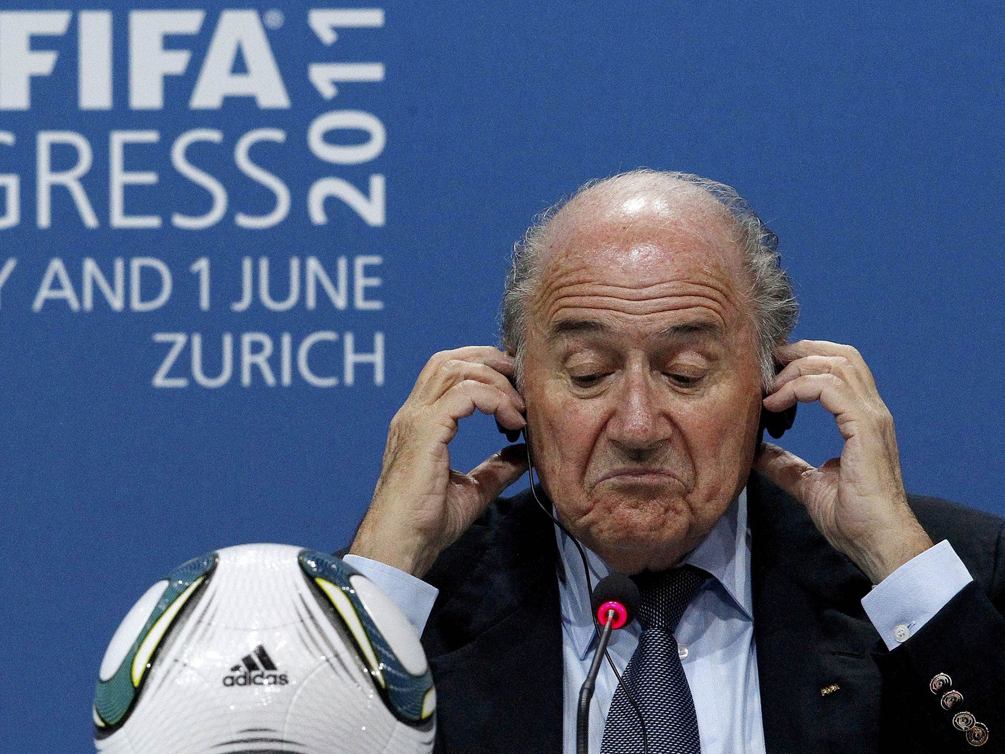 FIFA President Sepp Blatter reacts during a news conference in Zurich June 1, 2011