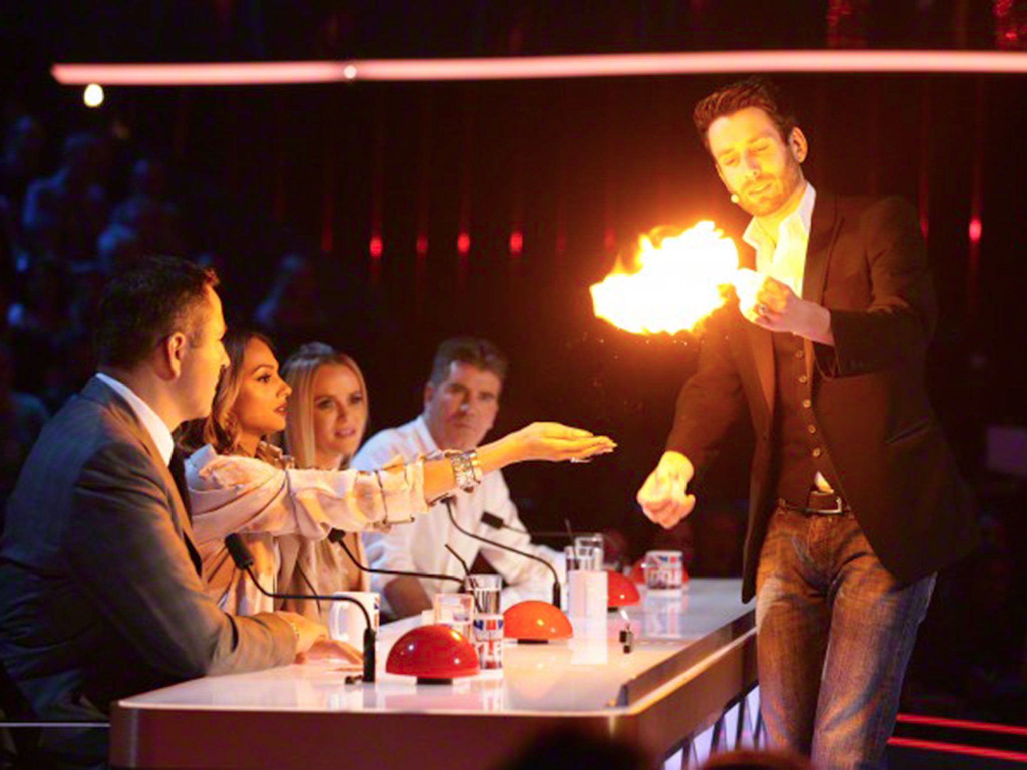 The Britain's Got Talent judges watch contestant Jamie Raven during the Britain's Got Talent live semi final show