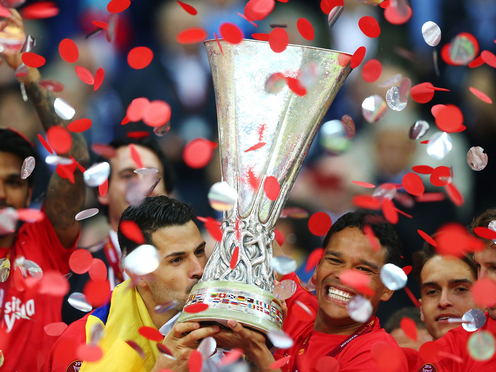 Carlos Bacca celebrates after Sevilla win the Europa League