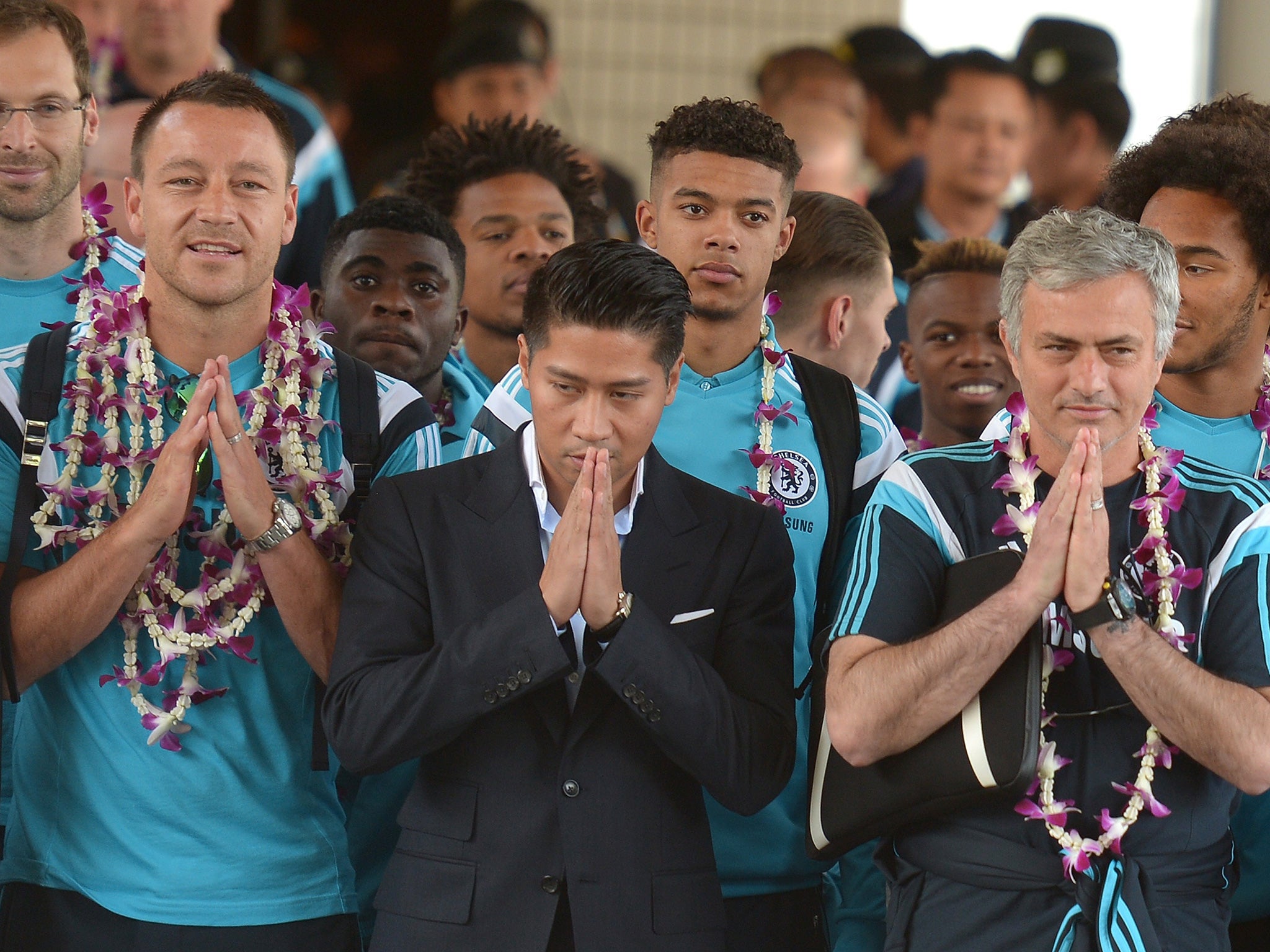 Terry and Mourinho join in the traditional Thai welcome (AFP/Getty)