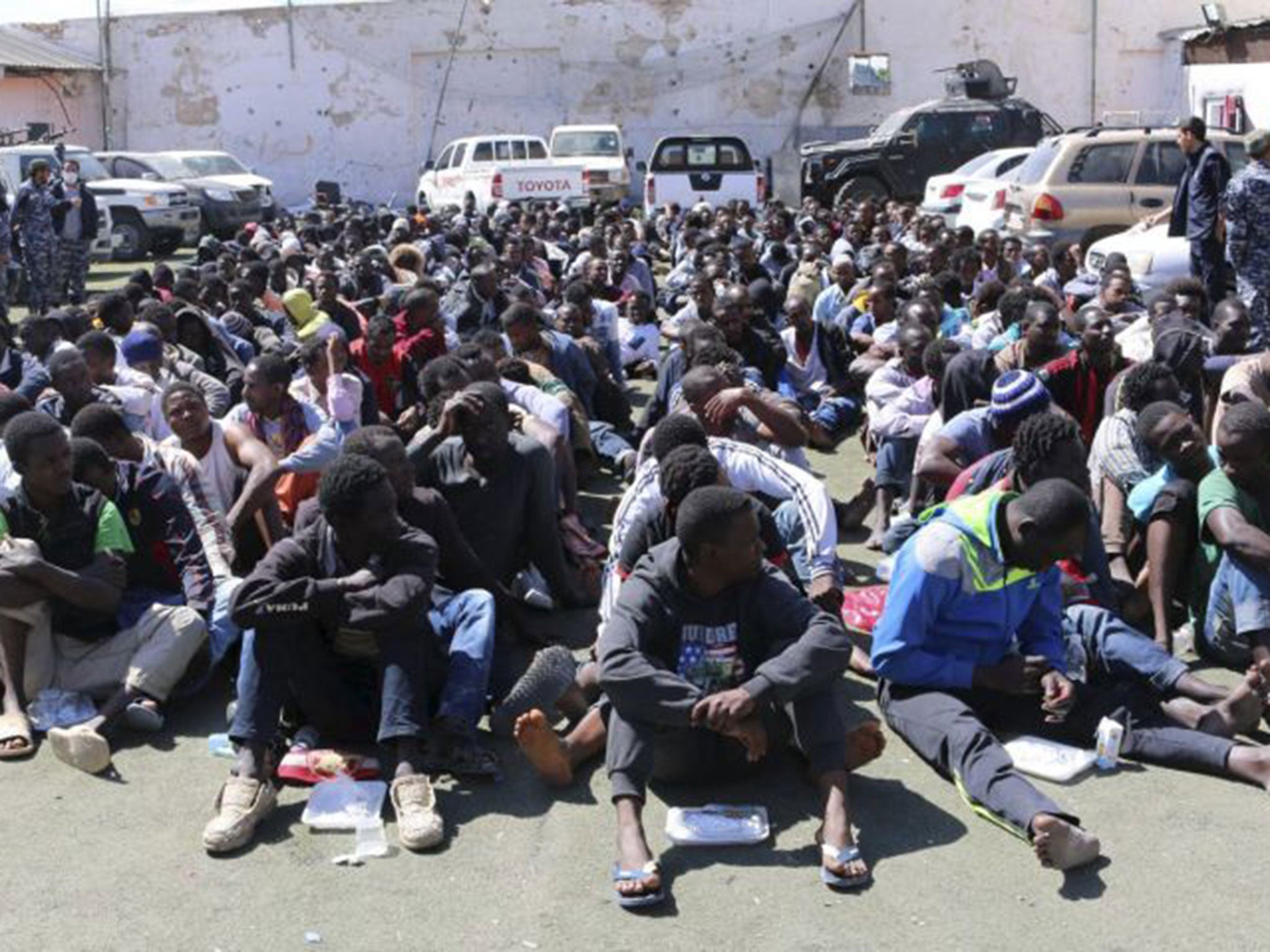 Risking all: African migrants wait in Tripoli after a failed attempt to make away at sea