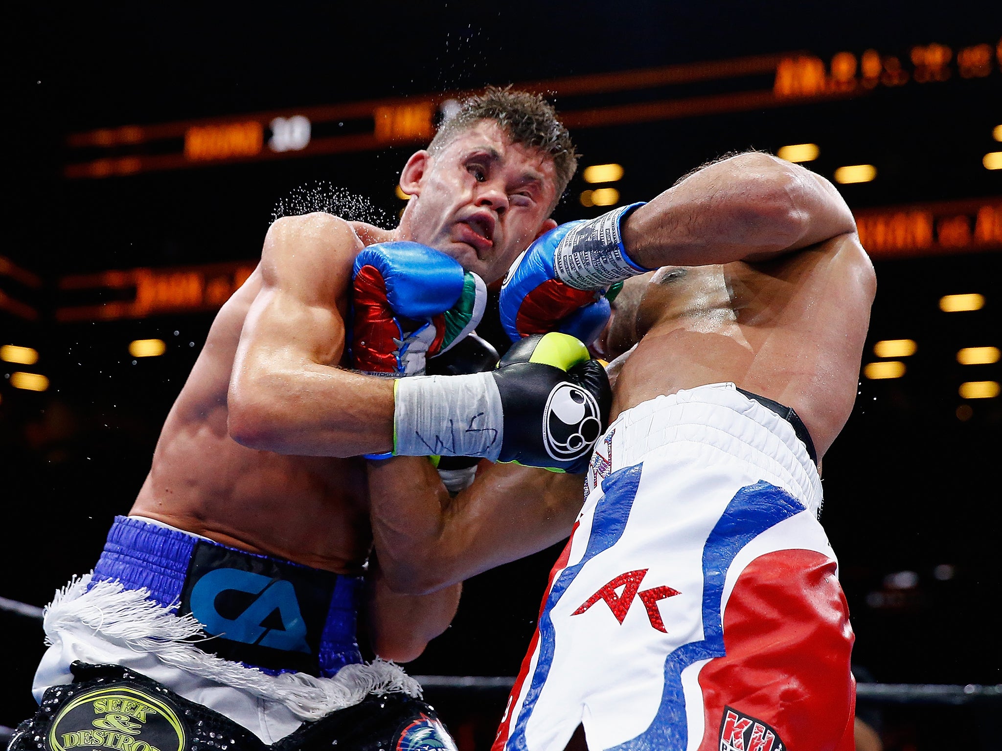 Amir Khan defeated Chris Algieri in New York on Friday night