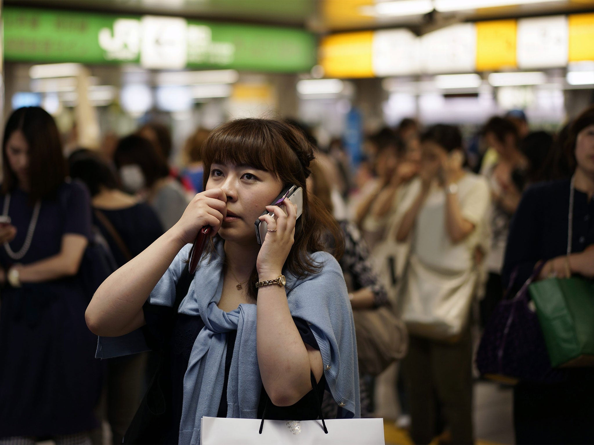 Commuters were trapped in Ikebukuro station after train services were suspended in and around Tokyo