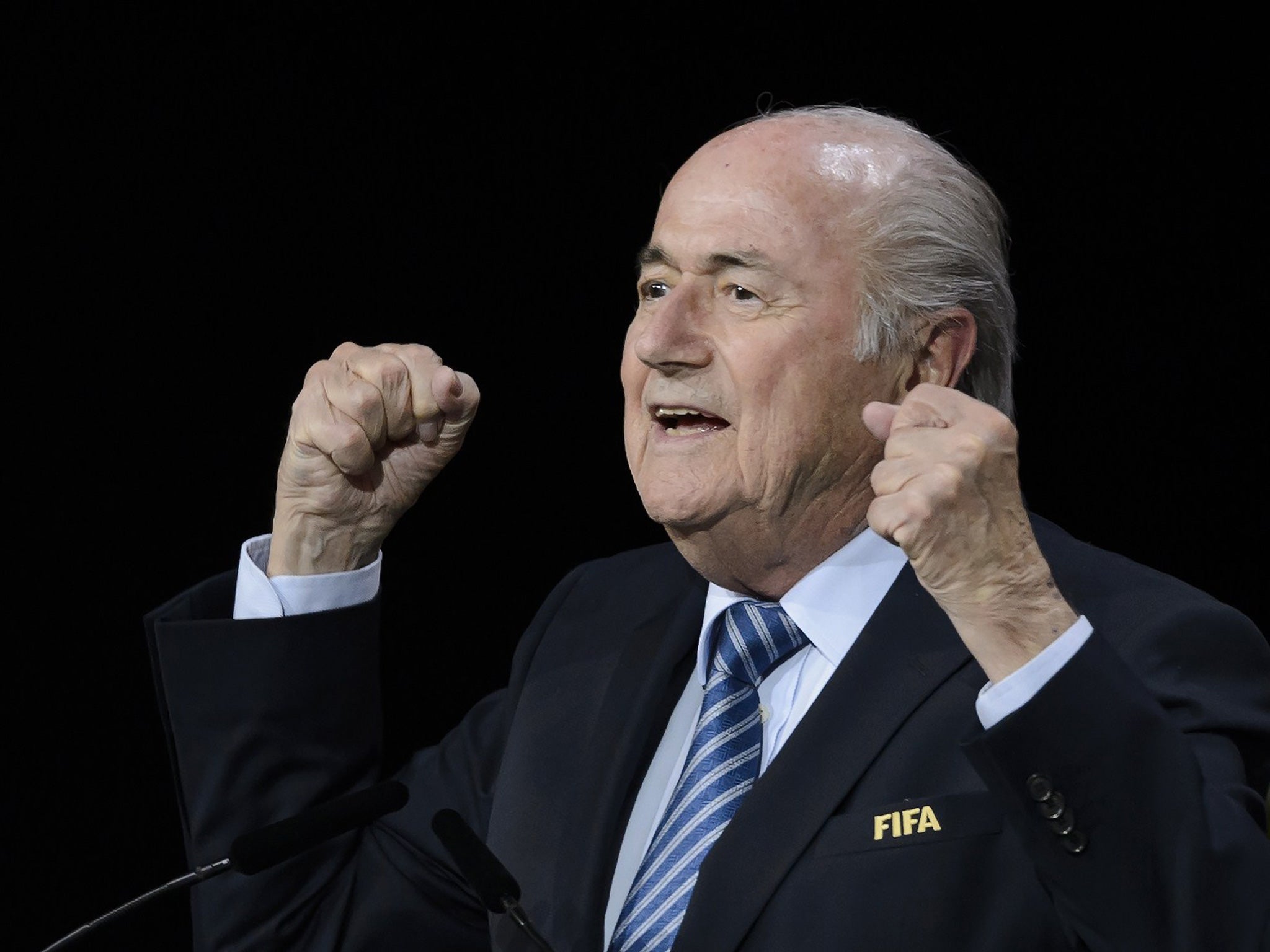 Blatter could not resist sniping at familiar enemies after his victory (AFP)