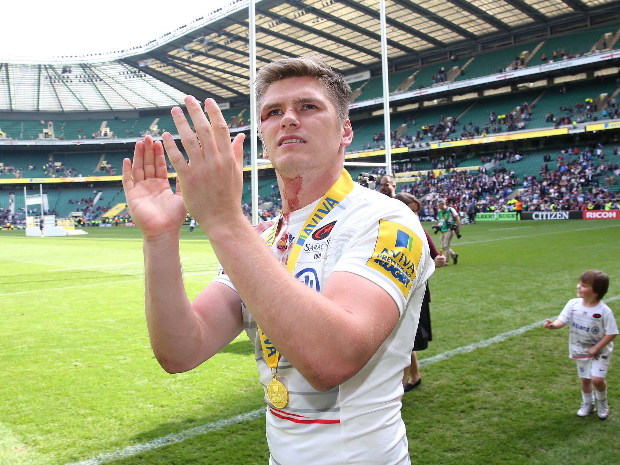 Owen Farrell applauds the Saracens fans after winning the Premiership final