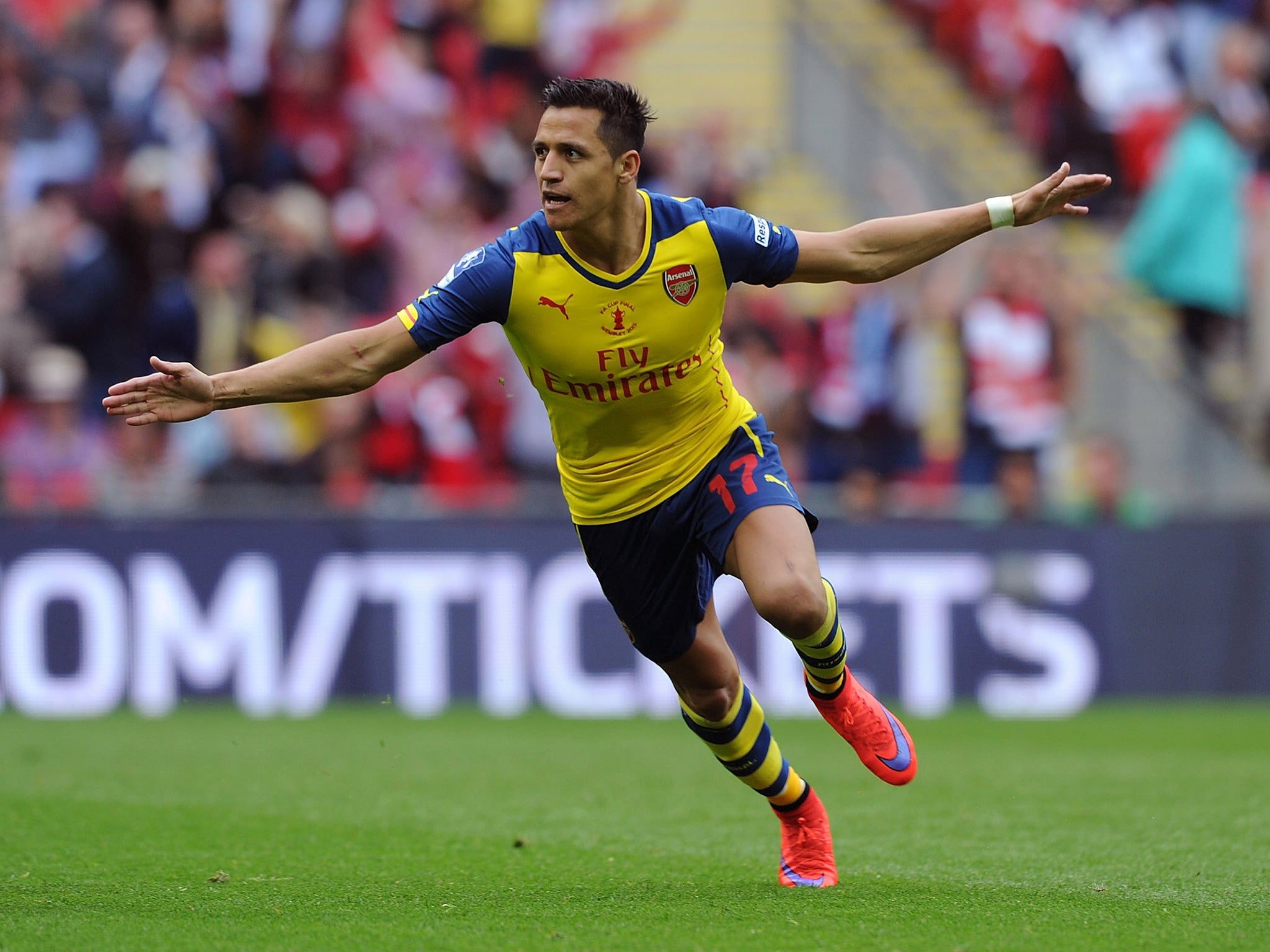 Alexis Sanchez celebrates scoring Arsenal's second in their 3-0 FA Cup final victory