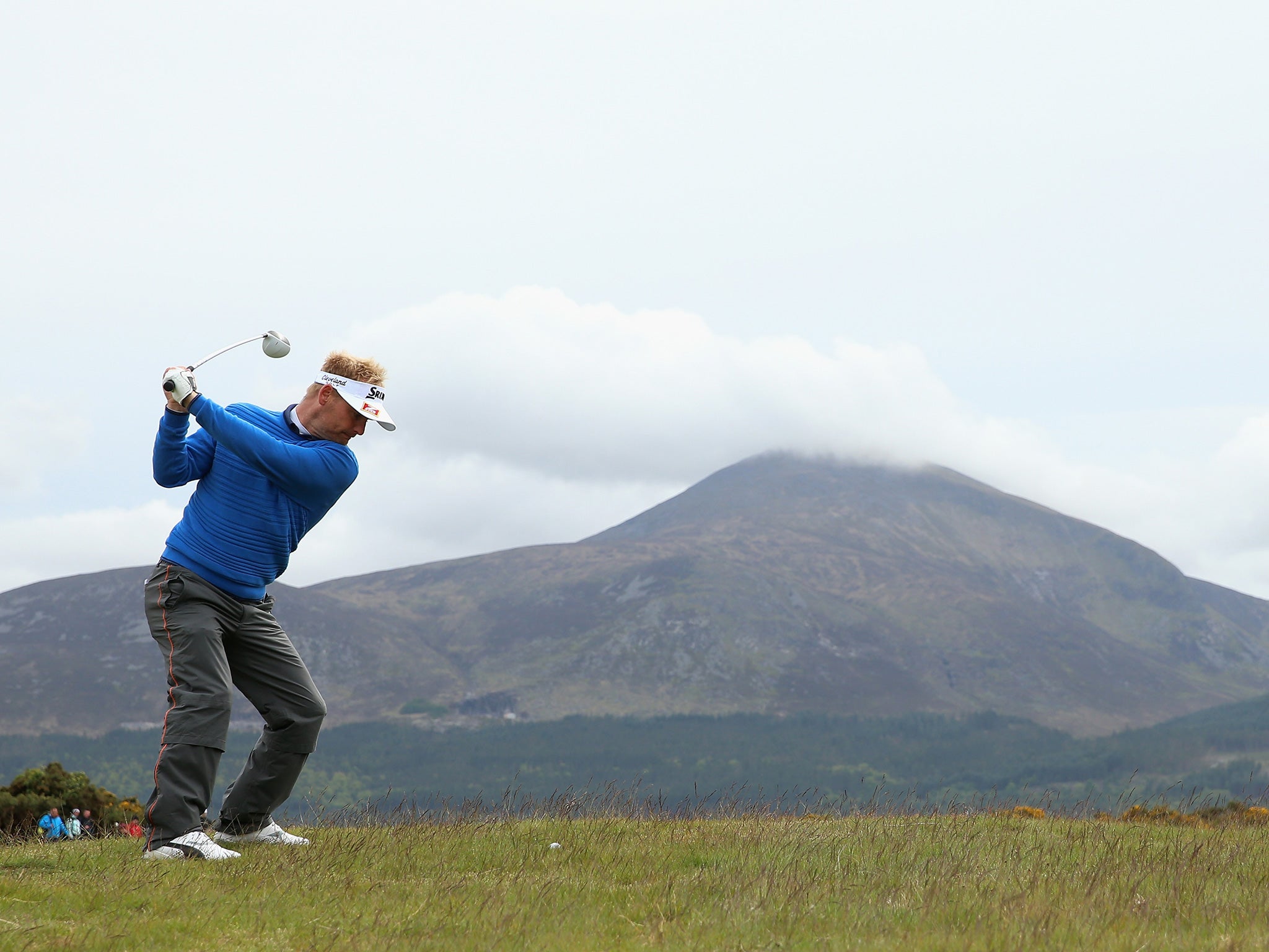 Denmark’s Soren Kjeldsen hits from the rough on the 15th hole in the third round of the Irish Open