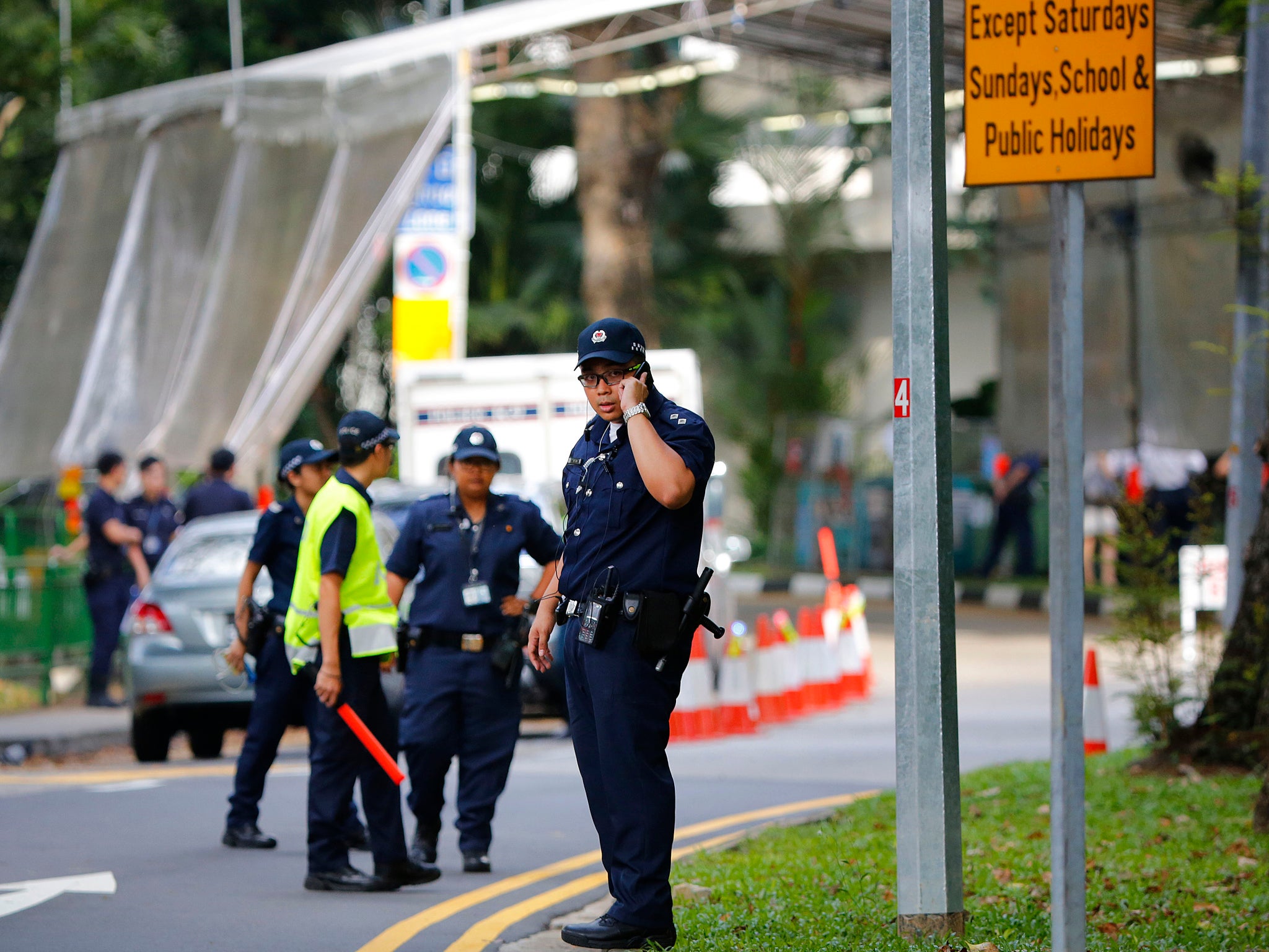 Police shot at the car after it rammed through barricades