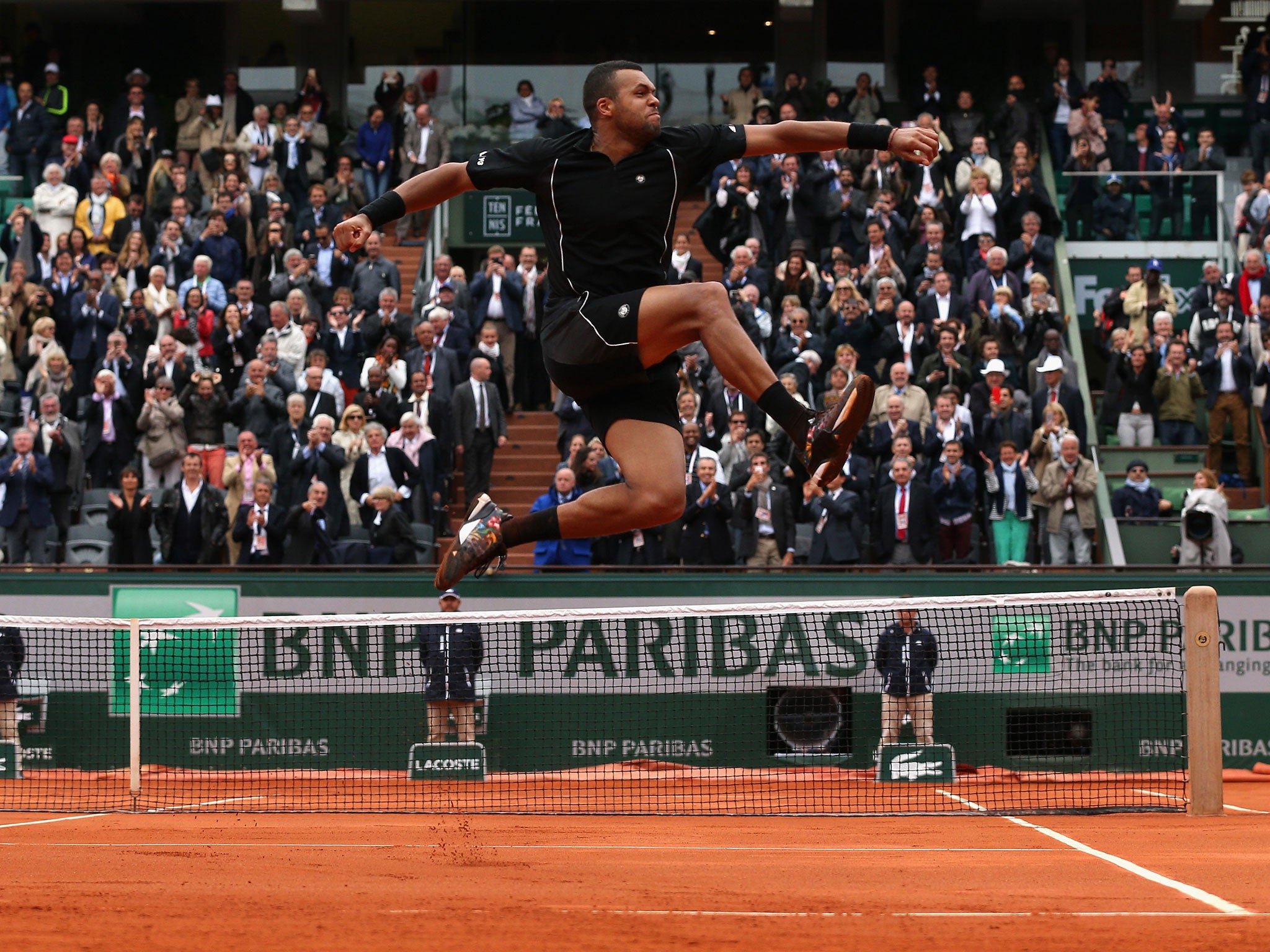 Jo-Wilfried Tsonga celebrates victory over Tomas Berdych