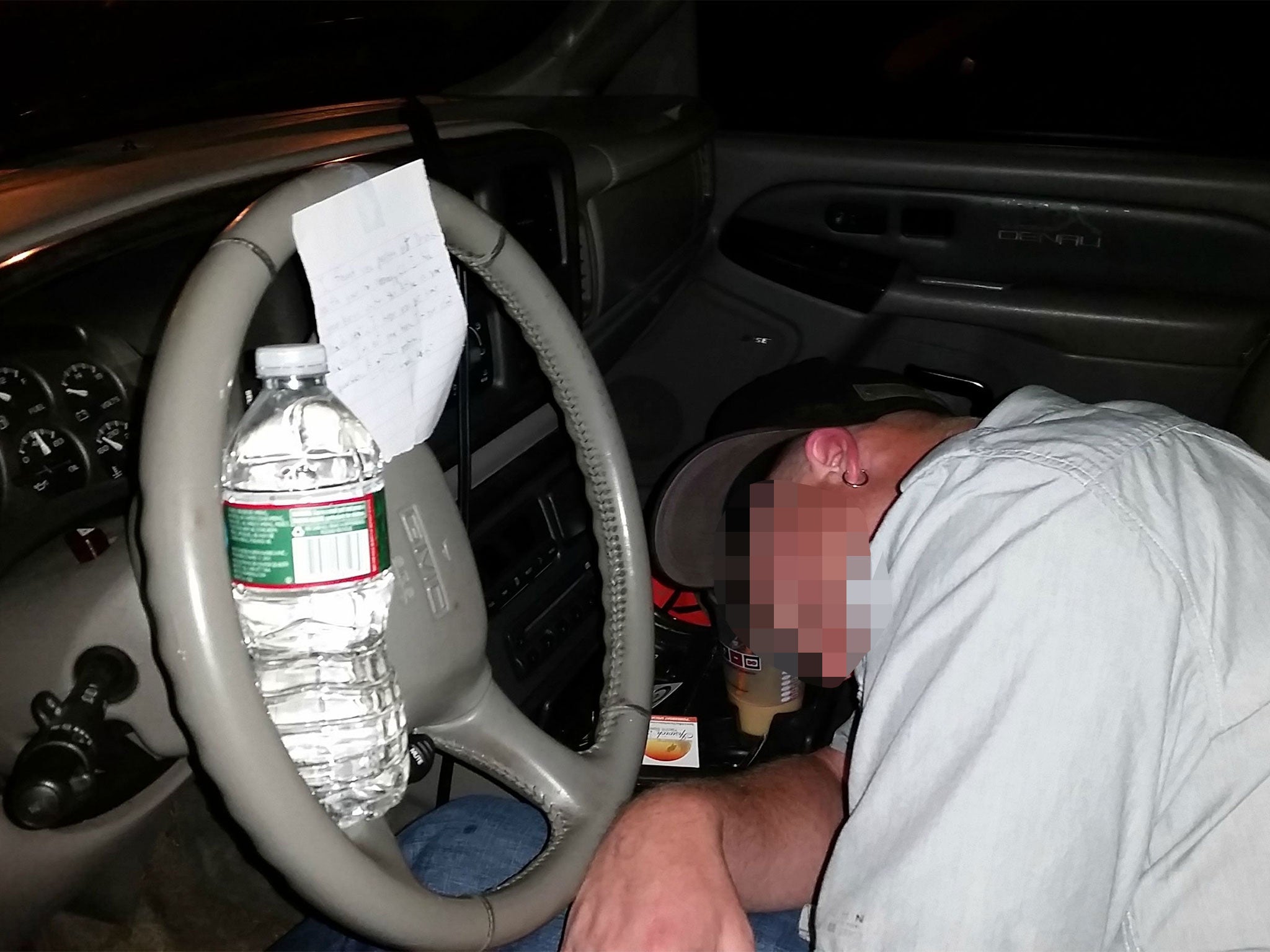 A 'drunk knight' did his best to help this man who he found slumped over at the wheel