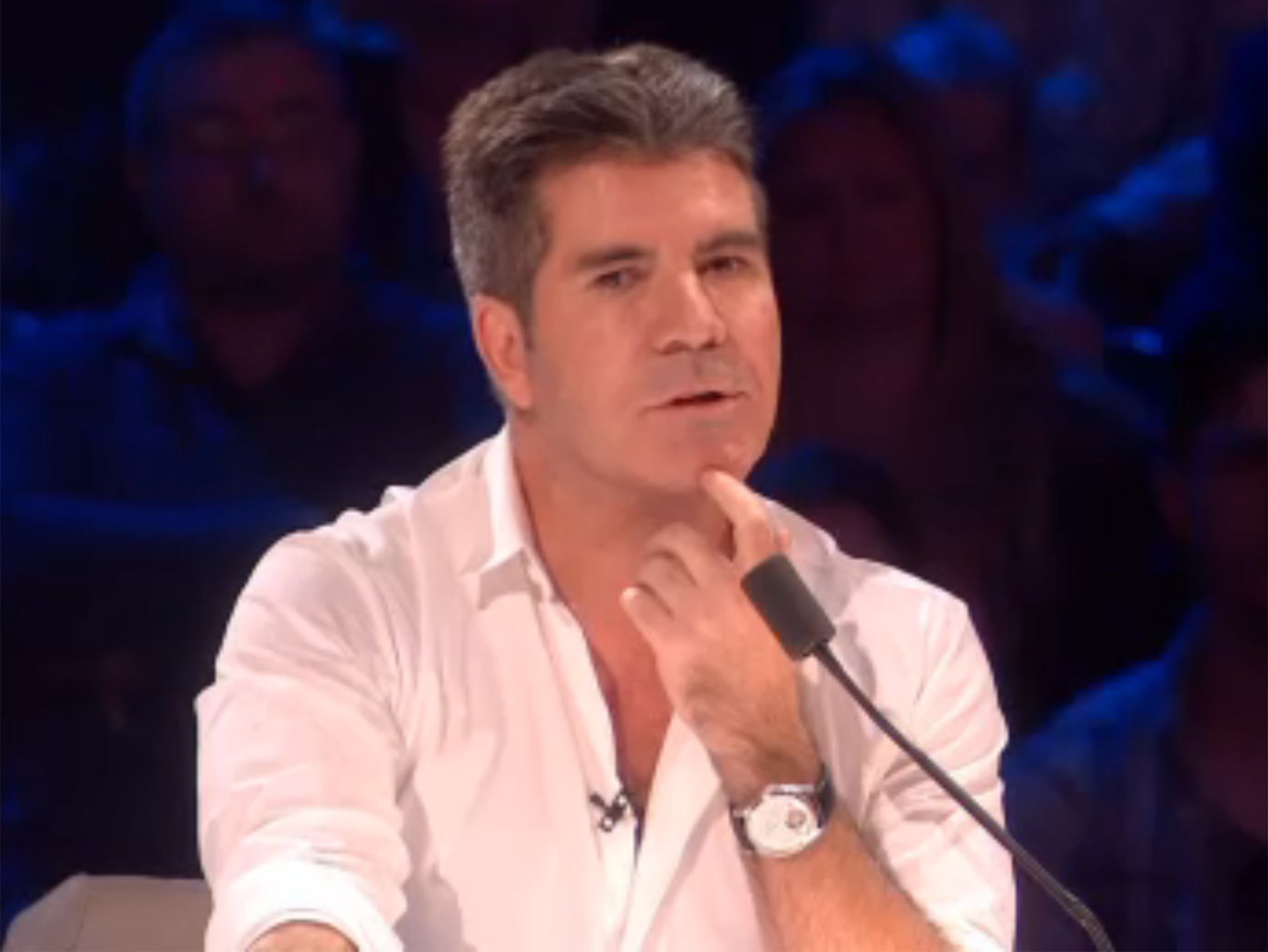 Simon Cowell on the Britain's Got Talent 2015 final sporting a shirt with a few too many buttons undone