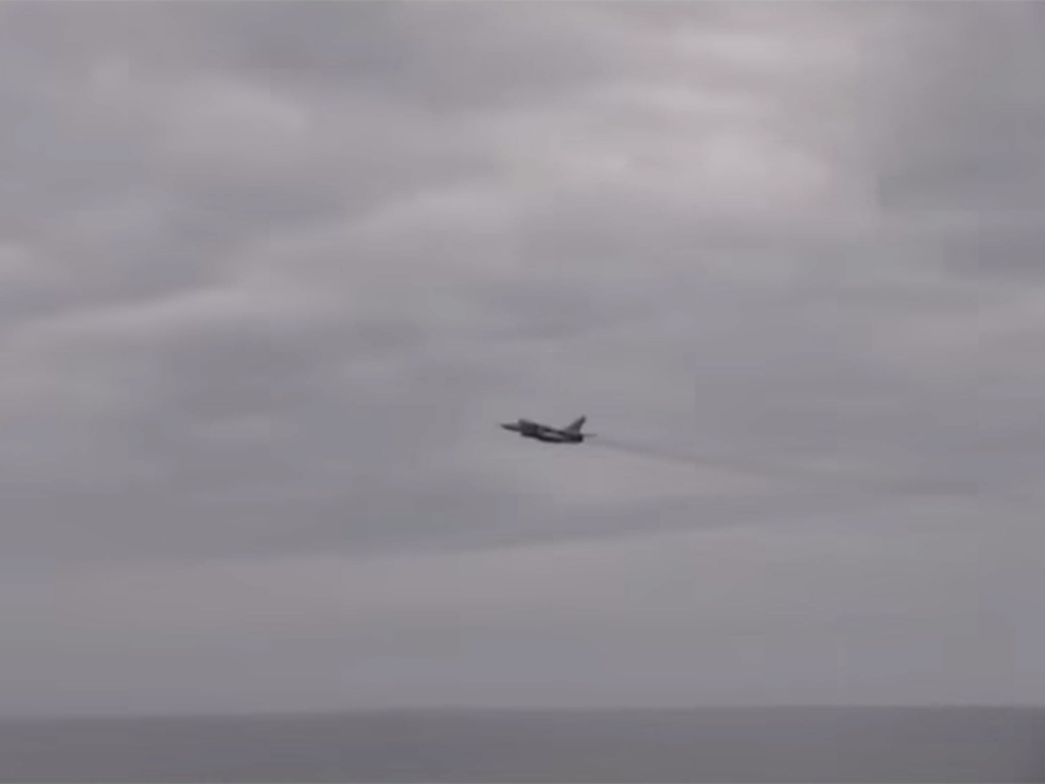 The plane can be seen and heard flying very close to the USS Ross, currently on operations in the Black Sea