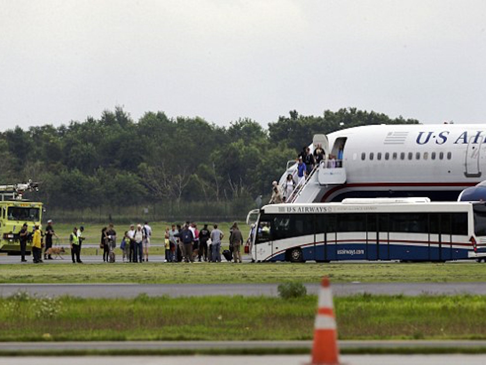 Police and sniffer dogs boarded the US Airways flight after it landed at Philadelphia International Airport