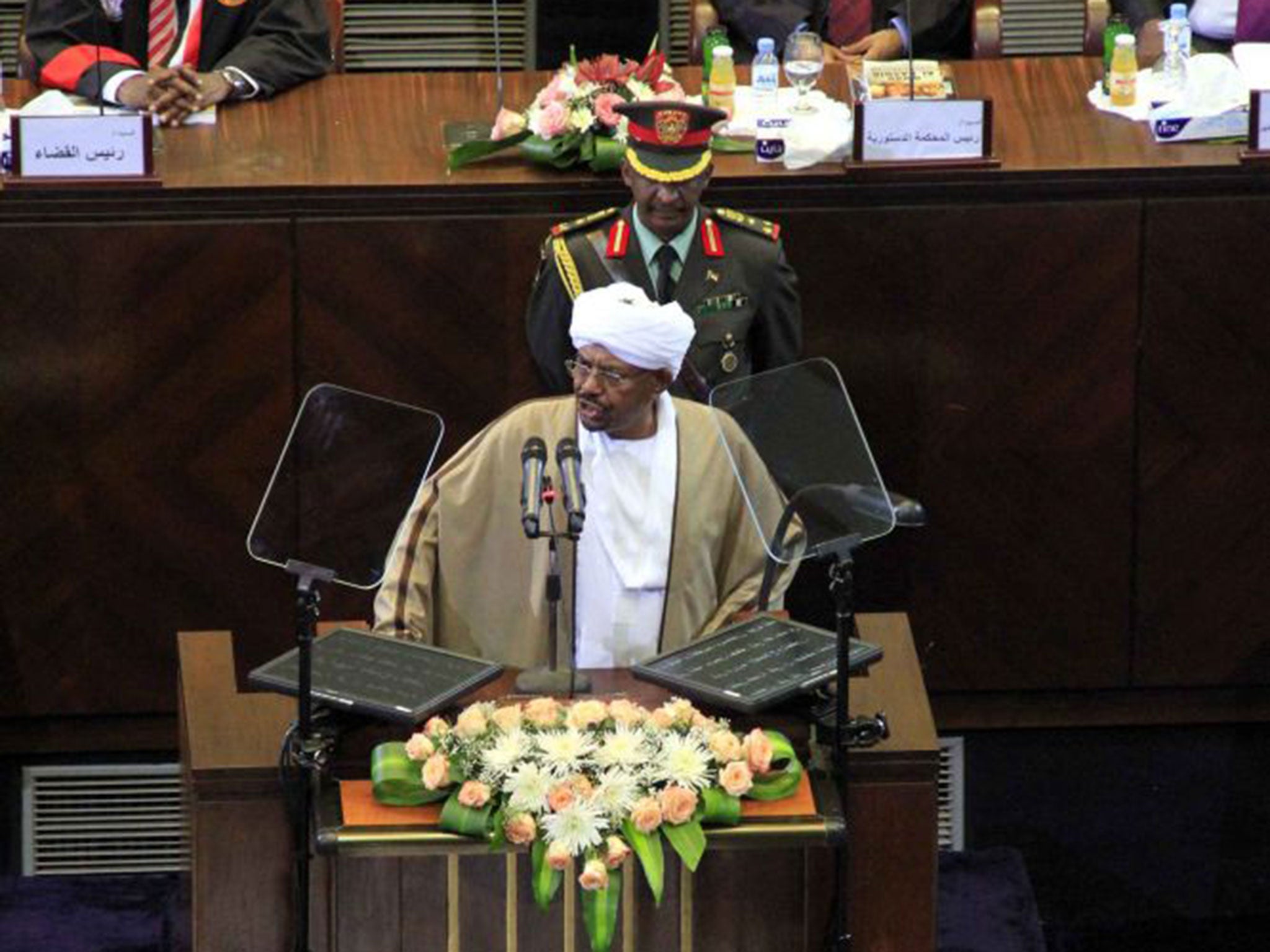 President Omar al-Bashir is sworn in at the National Assembly in Khartoum yesterday