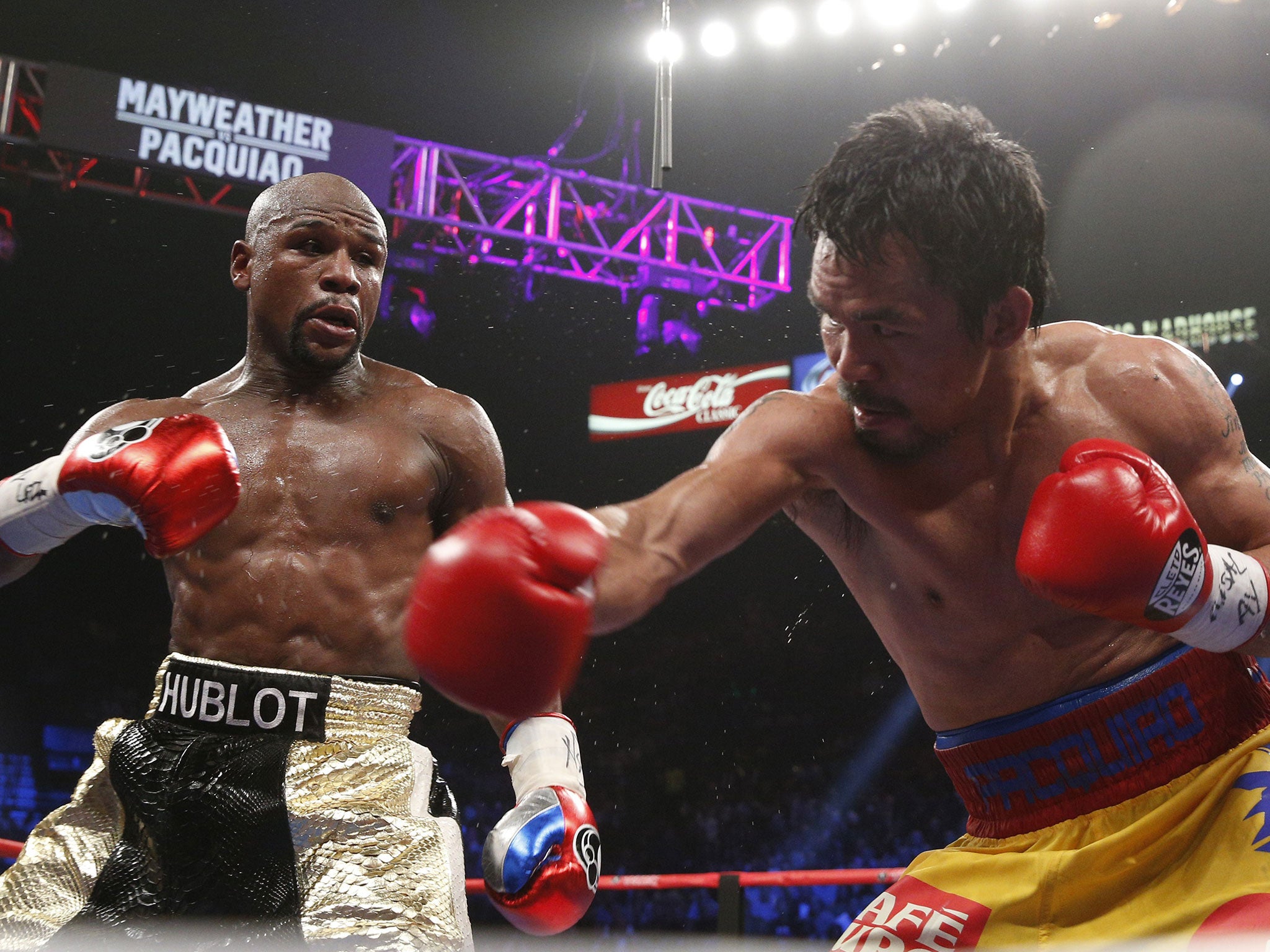 Floyd Mayweather and Rousey have an ongoing feud