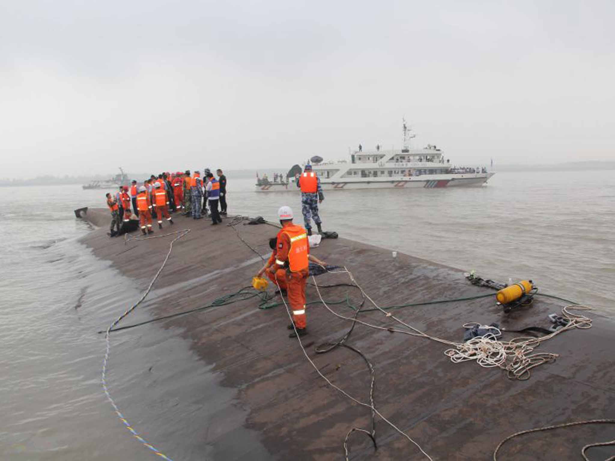 Tragedy: the upturned hull of the 'Eastern Star'