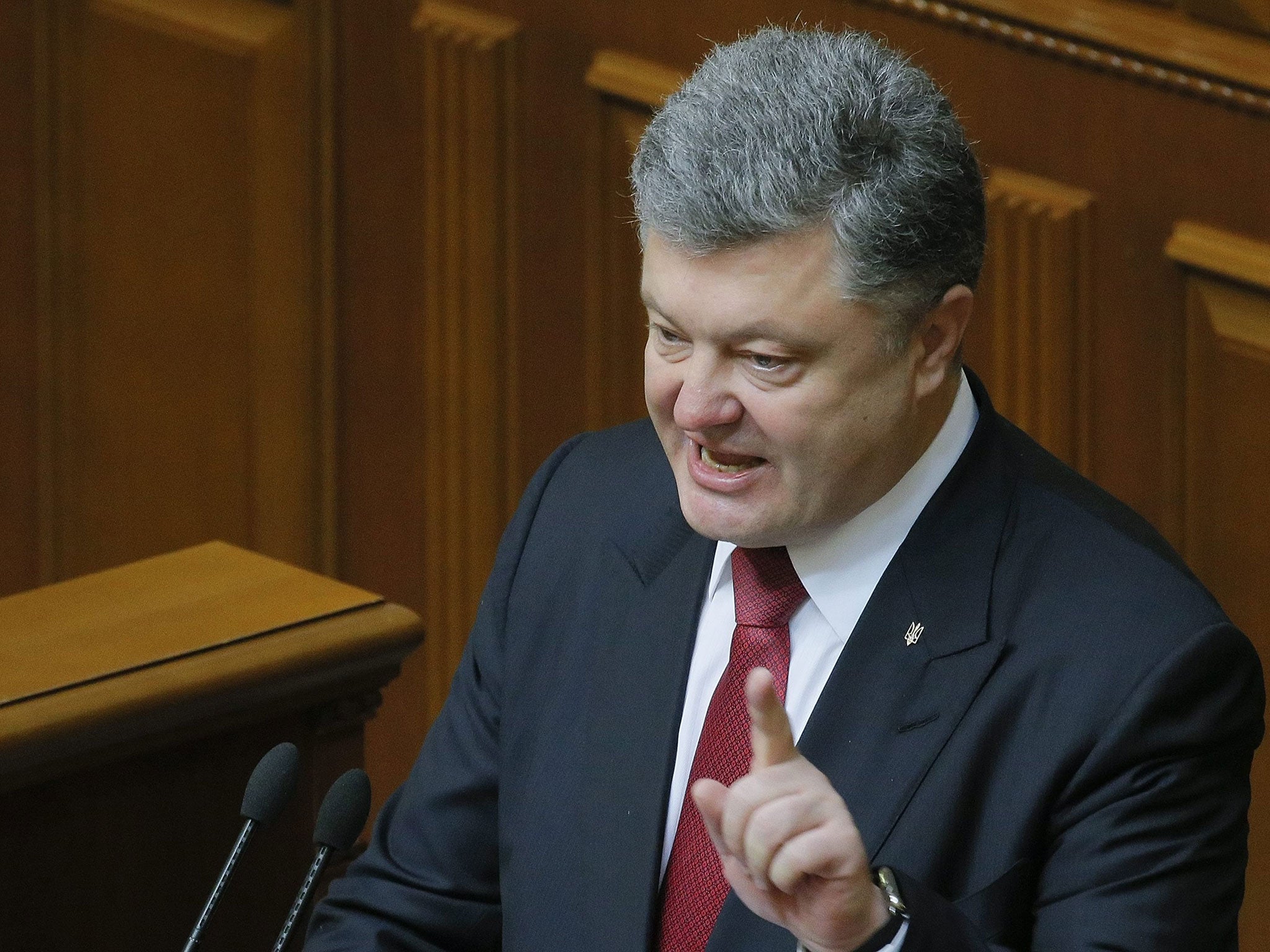 Ukrainian President Petro Poroshenko speaks to politicians during his annual address to Parliament in Kiev, 4 June 2015