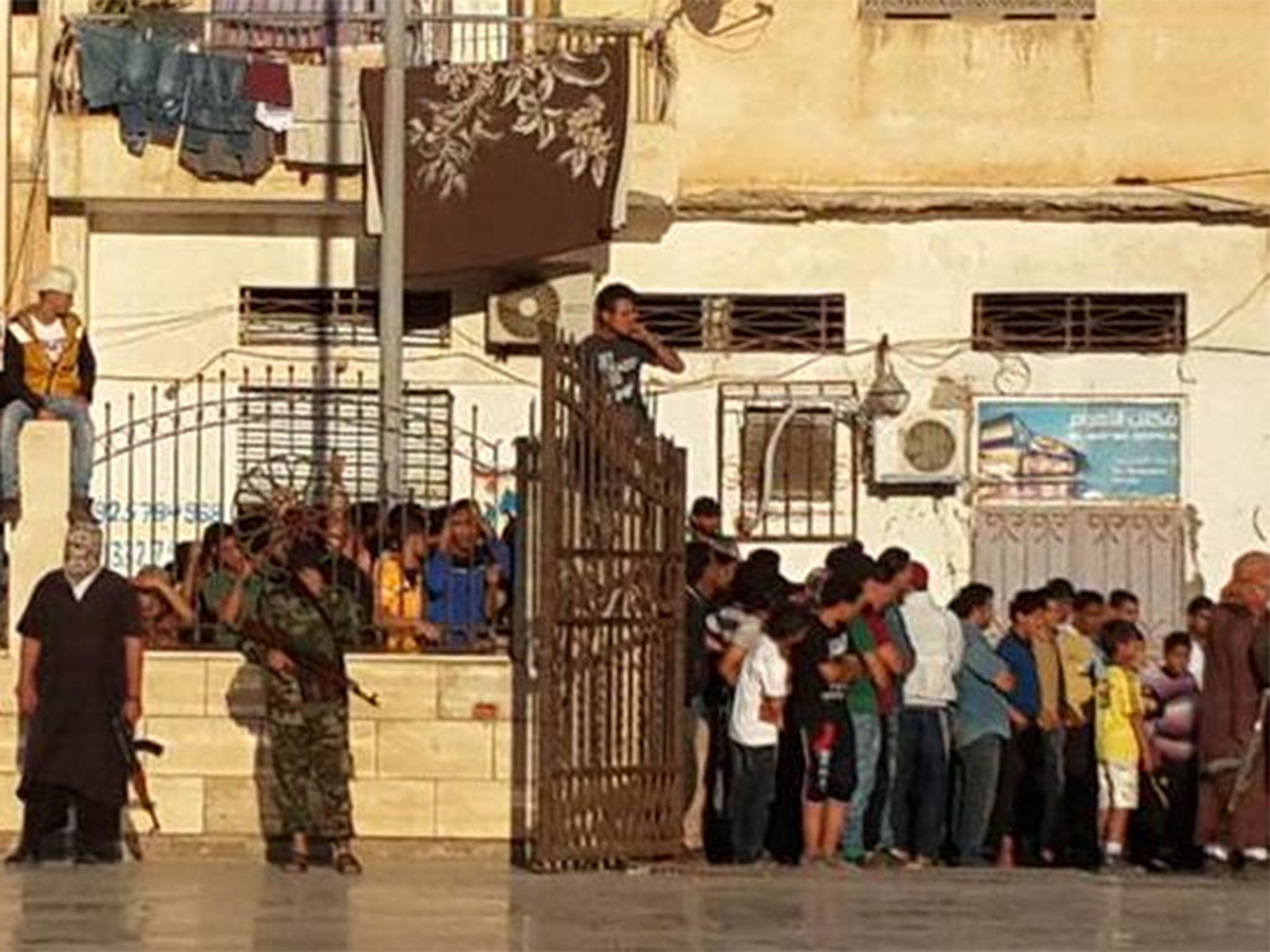 Images posted to social media from Derna showed masked militants executing hostage Abdulnabi al-Shurgawi