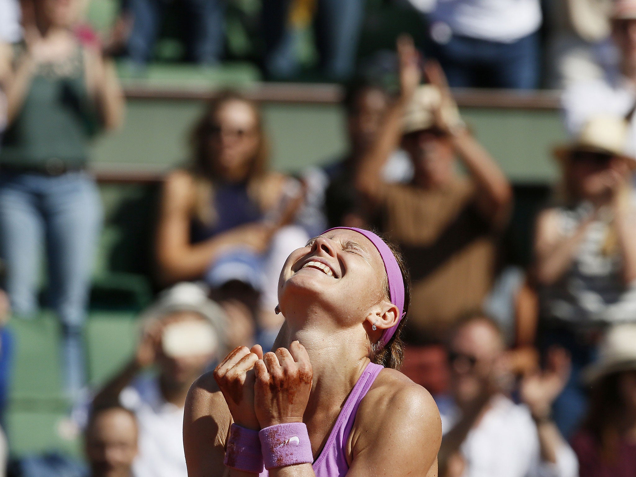 Lucie Safarova enjoys her victory over Ana Ivanovic