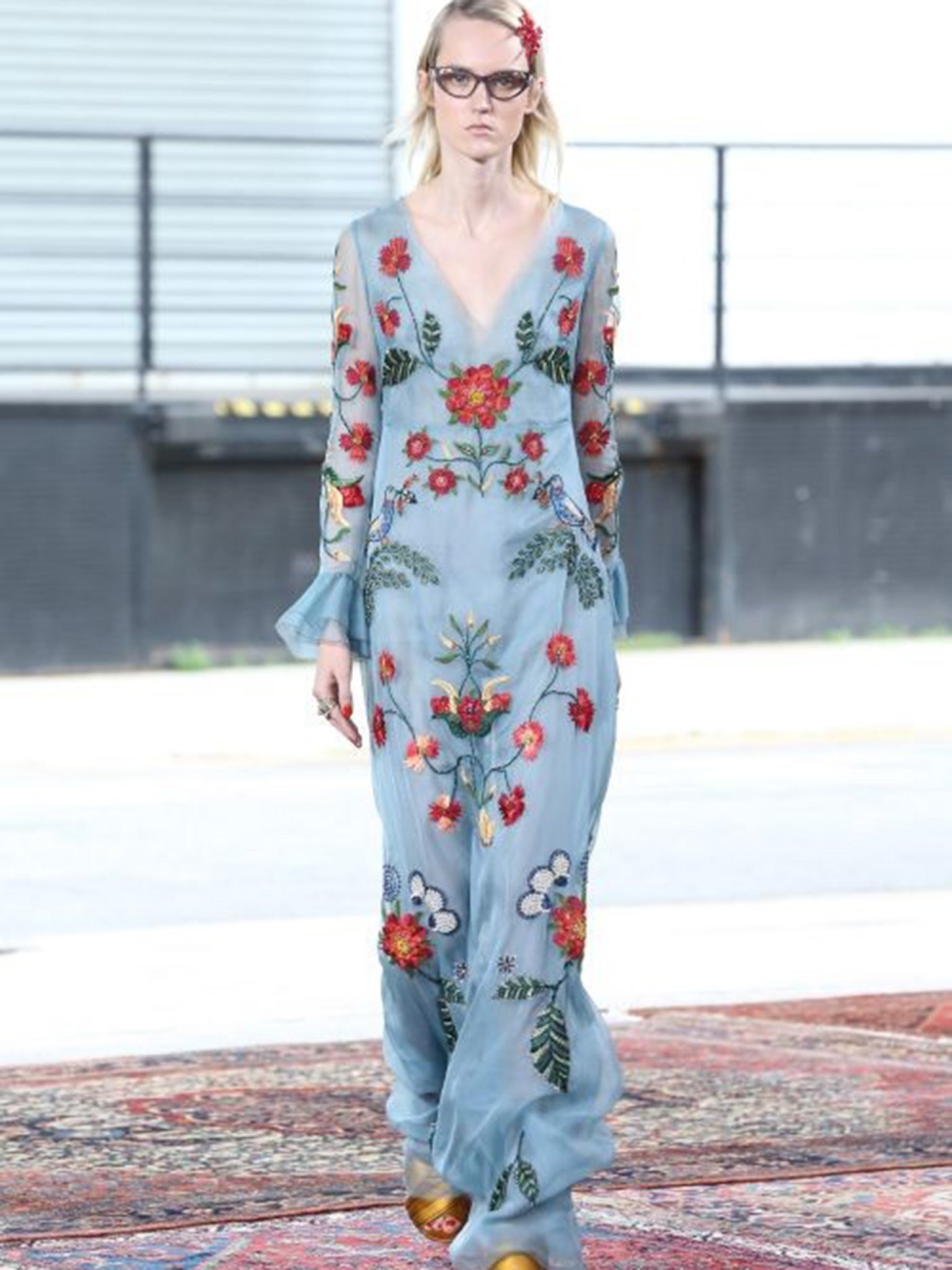 A model walks the runway at Gucci Cruise 2016