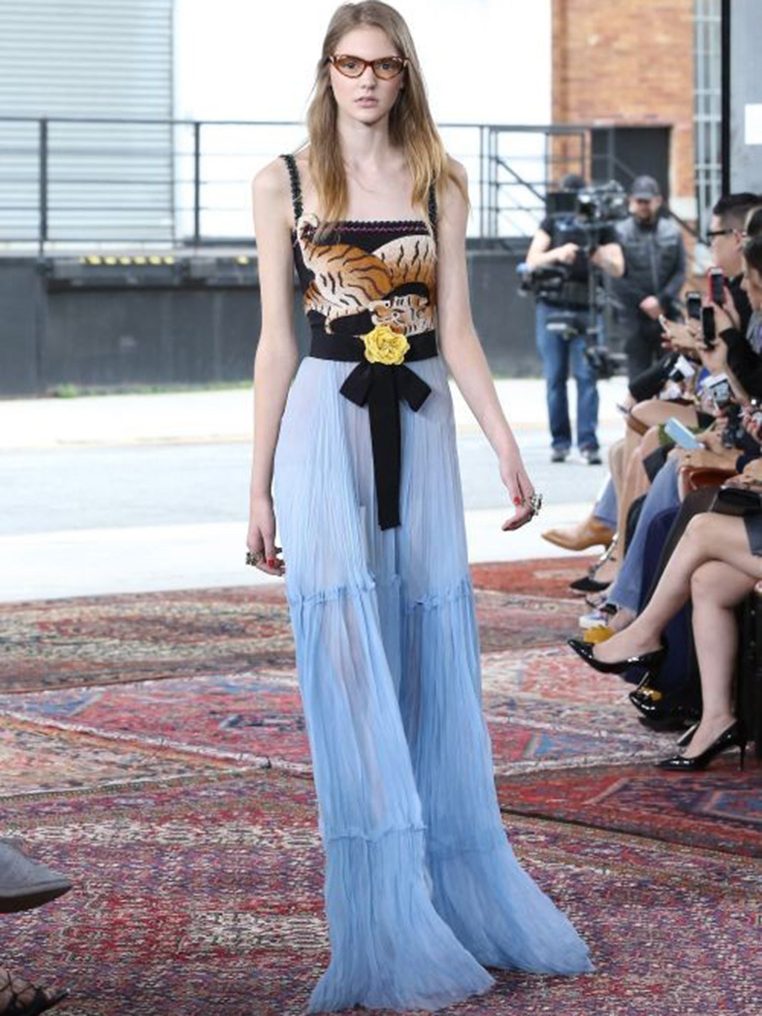 A model walks the runway at Gucci Cruise 2016