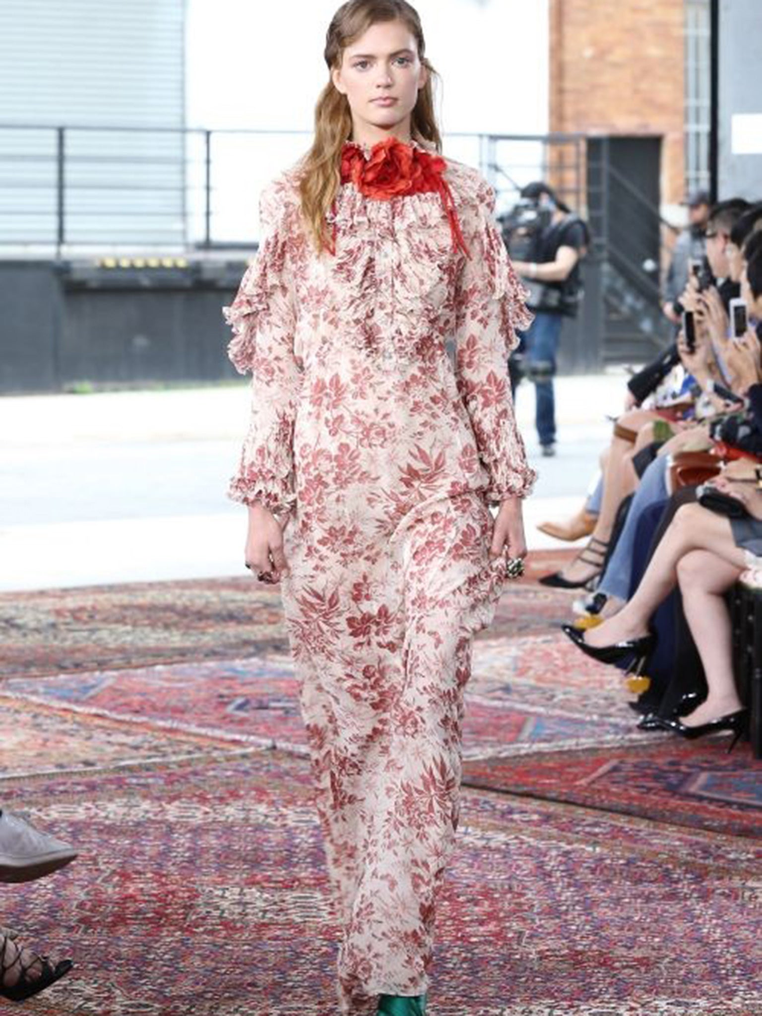A model walks the runway at Gucci Cruise 2016