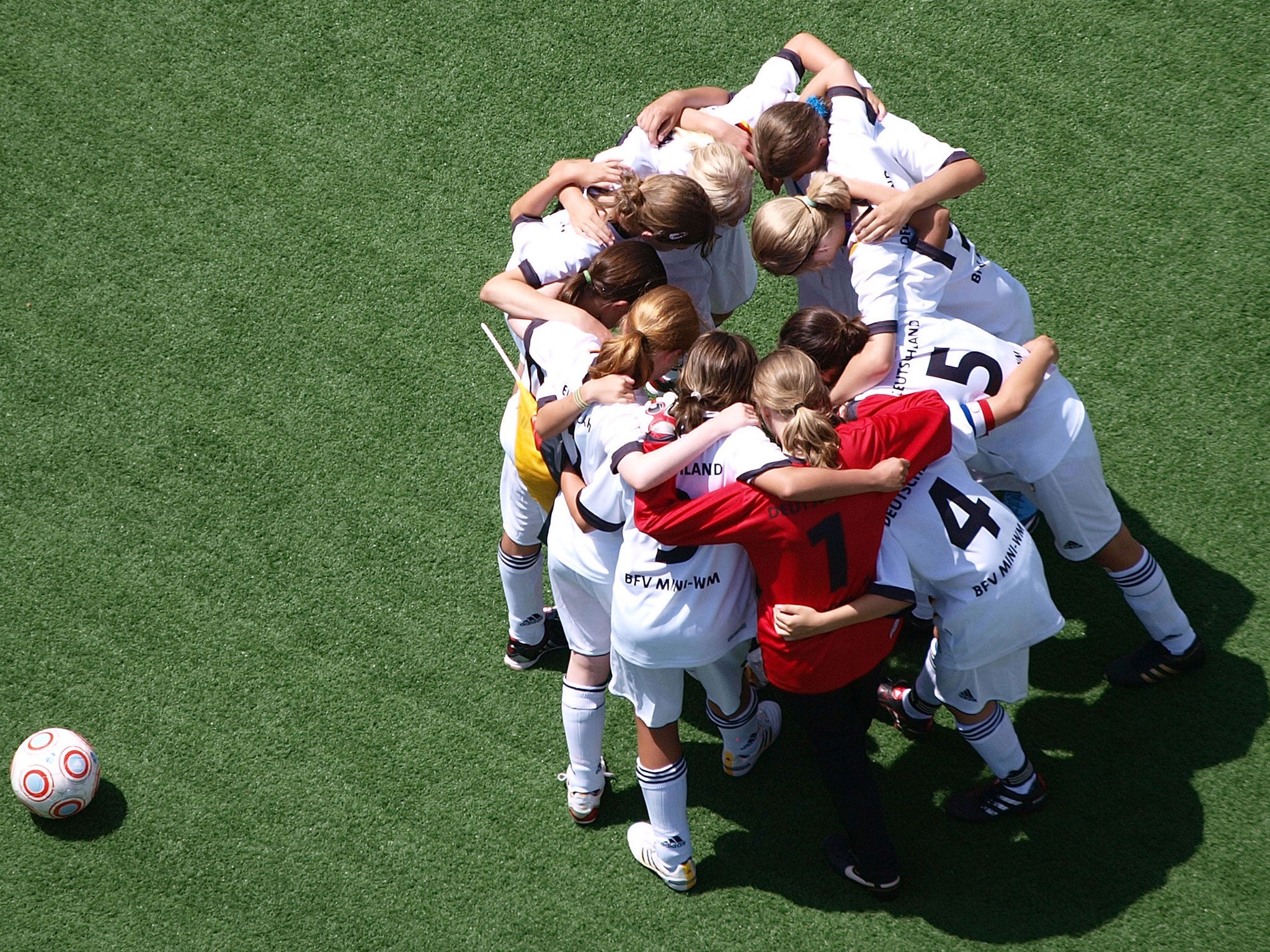 Football girls build a circle during the women's world cup 2010 roadshow, seen on July 10, 2010 in Augsburg, Germany. Augsburg will be venue of the women's U20 football world cup 2010