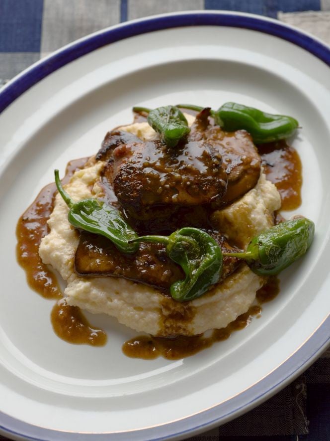 Soft polenta with duck livers and padrón peppers (photograph: Jason Lowe)