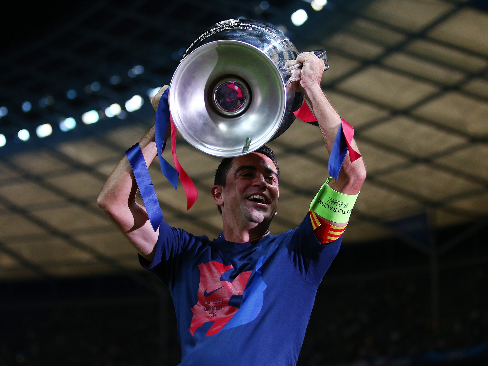 Xavi lifted the final trophy of his storied Barcelona career