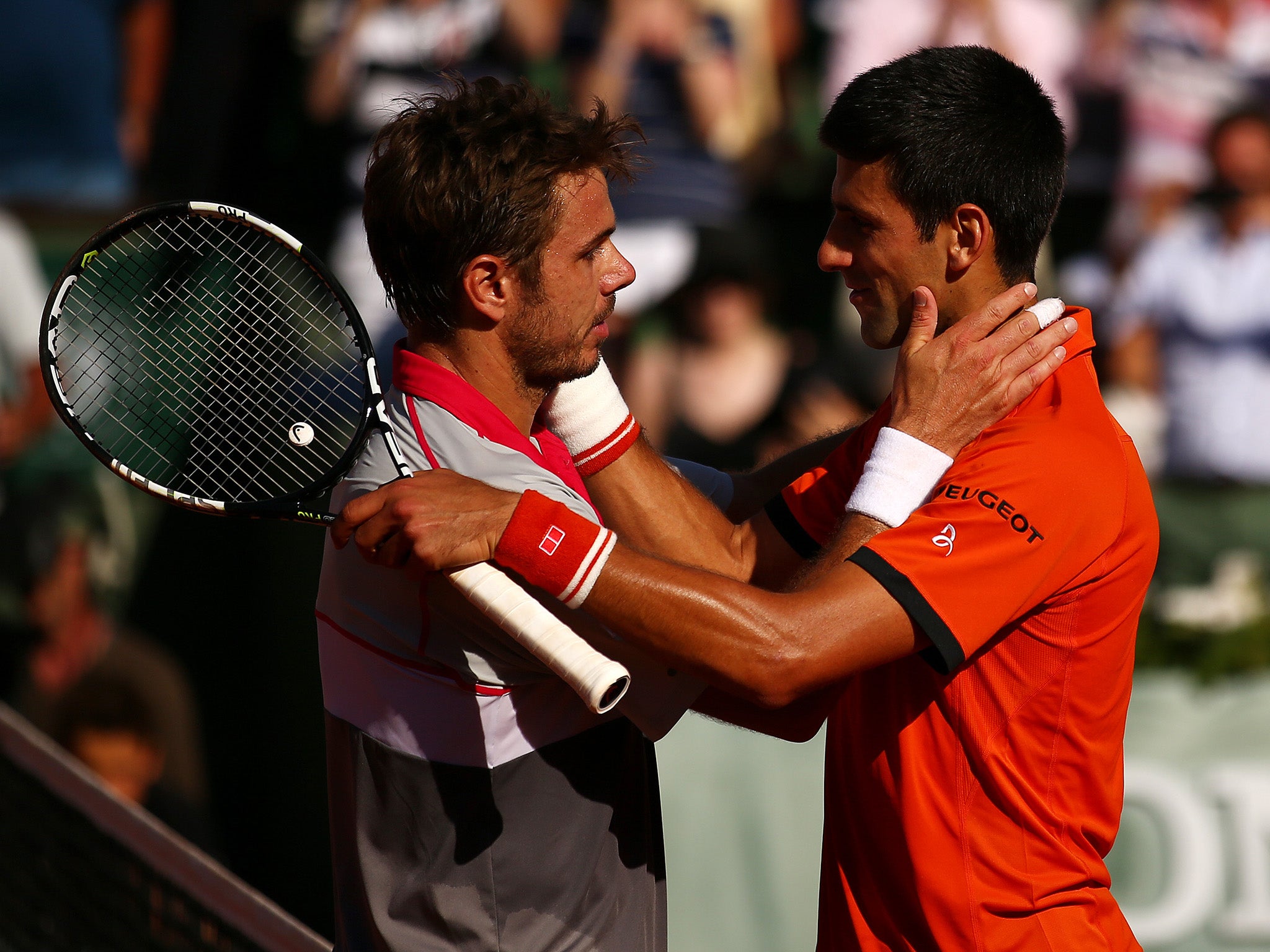 Djokovic embraces Stan Wawrinka after losing the French Open